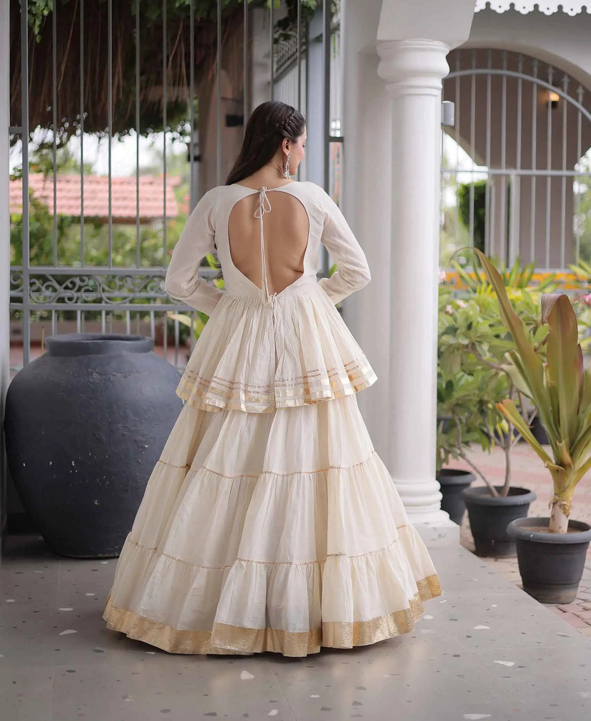 White Lehenga With Peplum Style Blouse