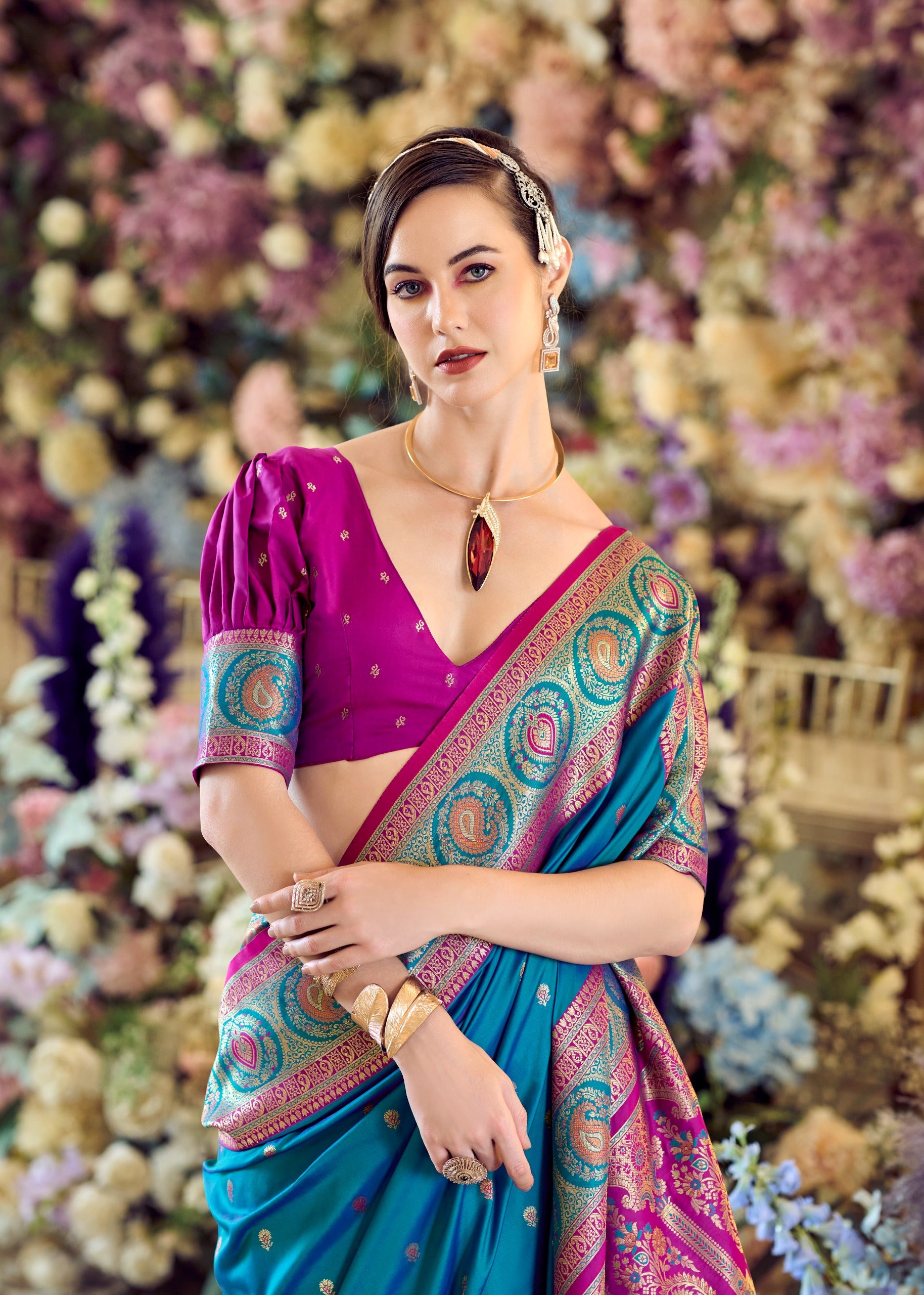 Teal blue Banarasi silk saree with zari weaving, contrast border, and designer pallu