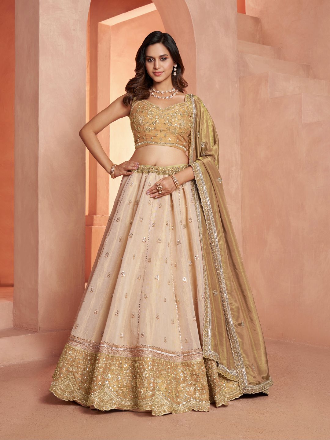 Graceful Gold Lehenga Featuring Handcrafted Embroidery