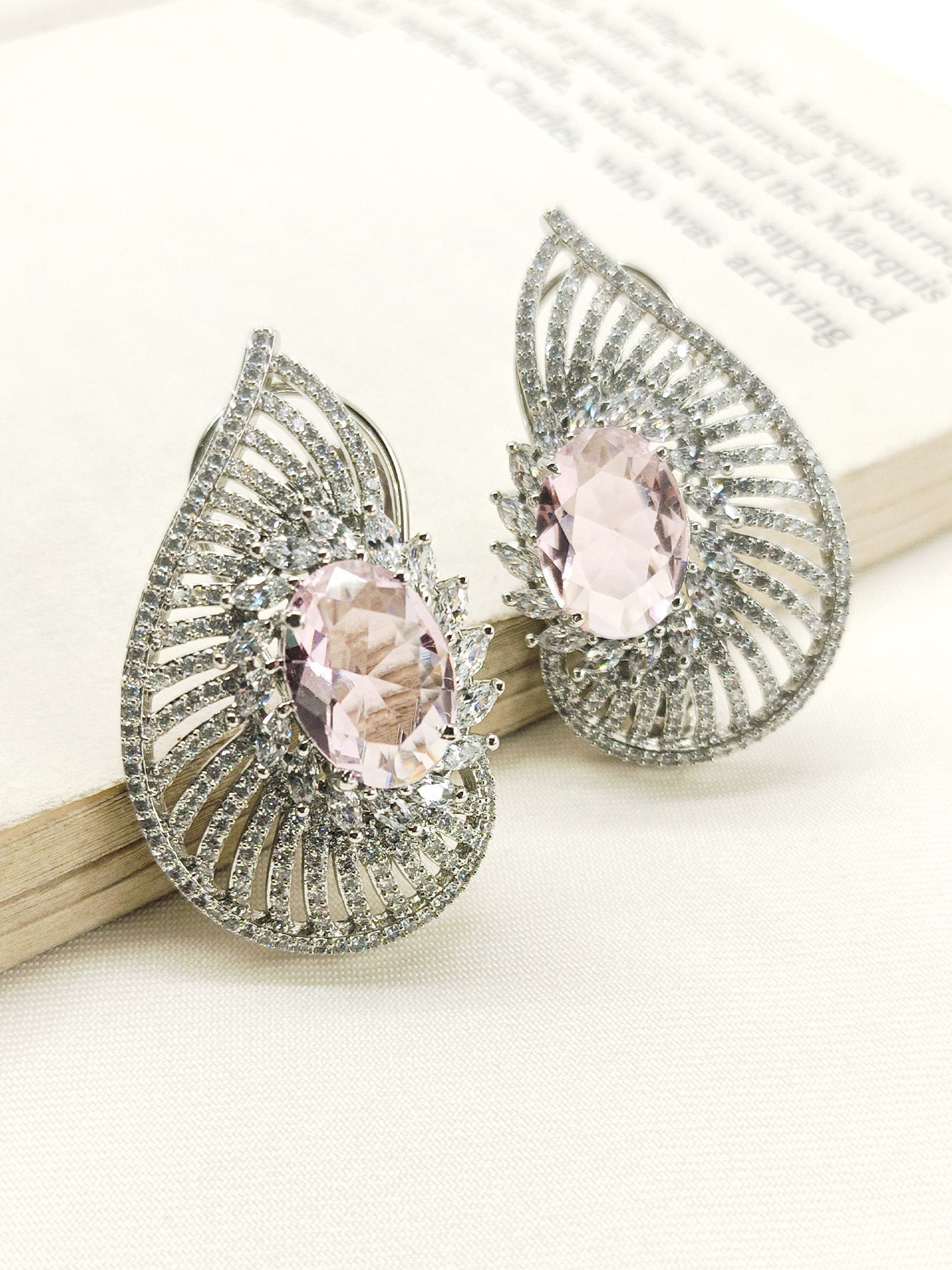 Rashmika Baby Pink American Diamond Tops expertly crafted from silver plated brass metal, exuding elegance and sophistication, perfect for any occasion