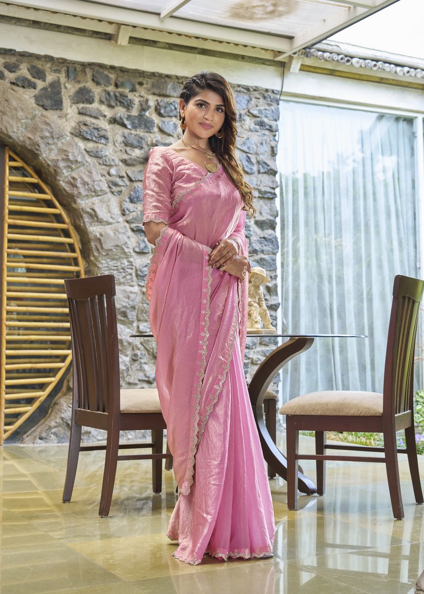 Beautiful pink satin silk saree with intricate handwork and zarkan embellishments
