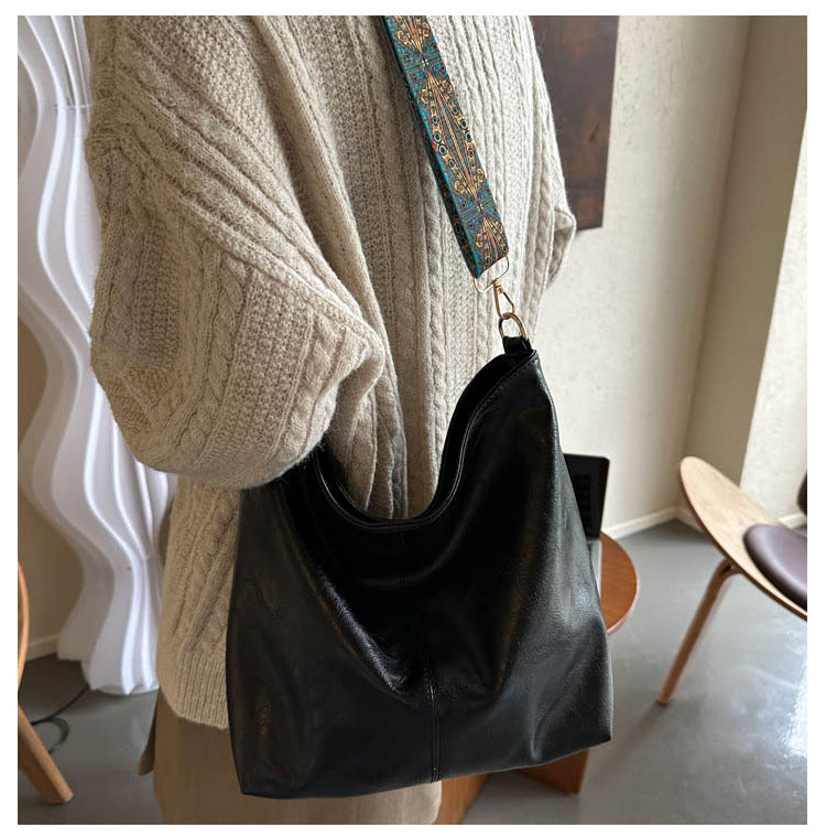 Women's Convertible Crossbody Bucket — Monochrome PU Carryall with Artisan-Embroidered Strap