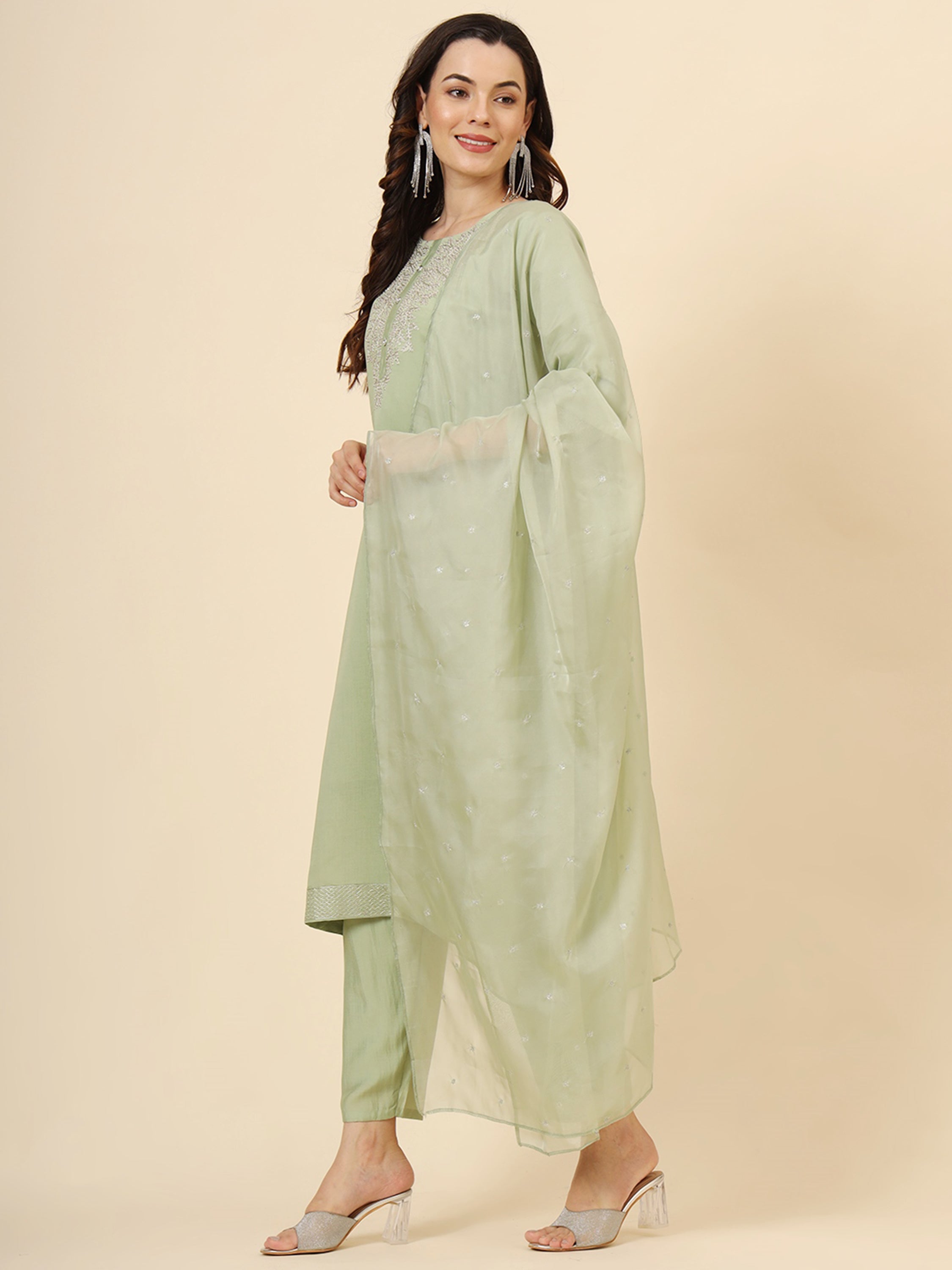Beautifully embroidered pista green muslin silk suit with matching pants and organza dupatta
