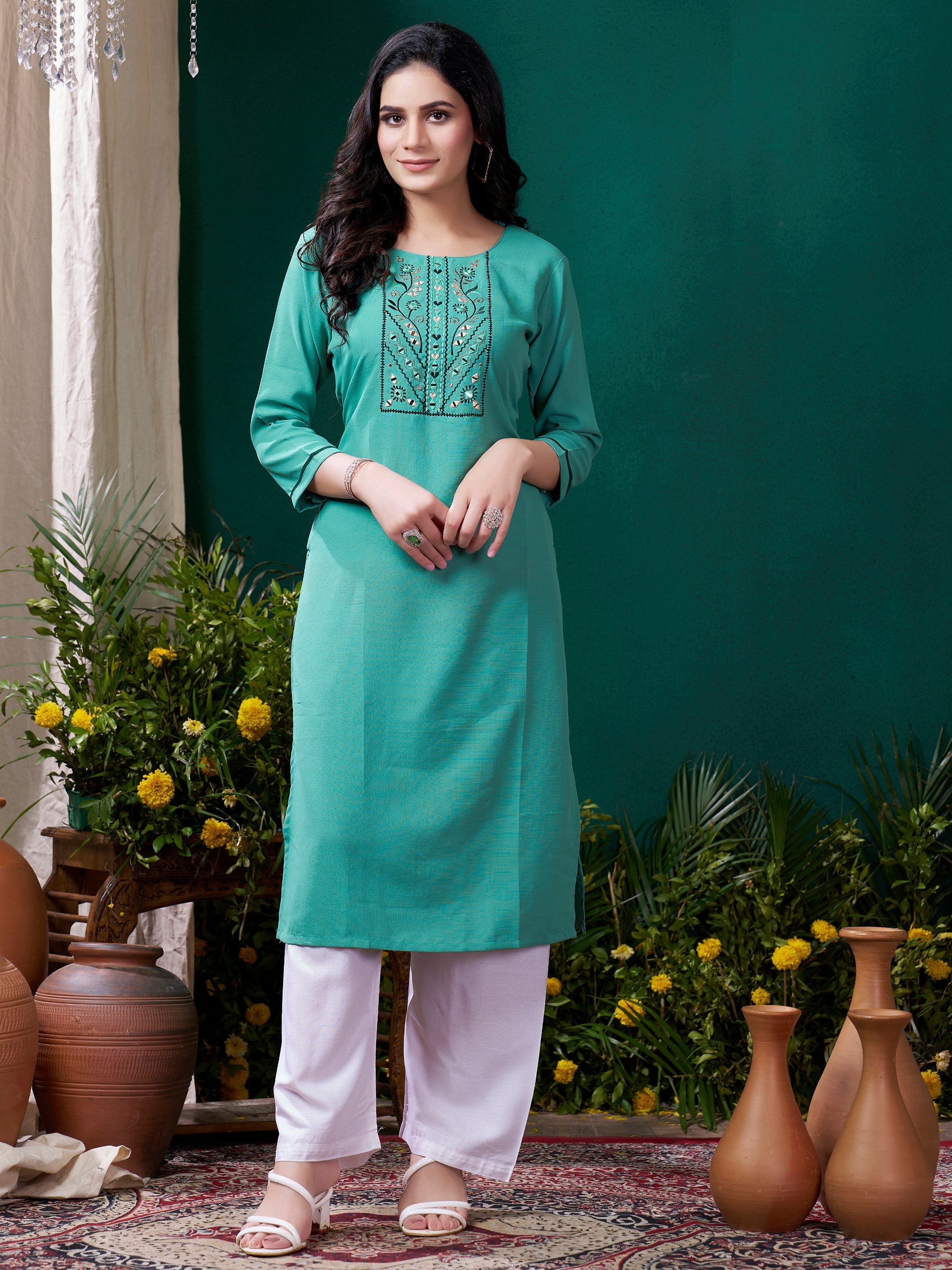 Beautifully designed sea green suit with exquisite embroidered work