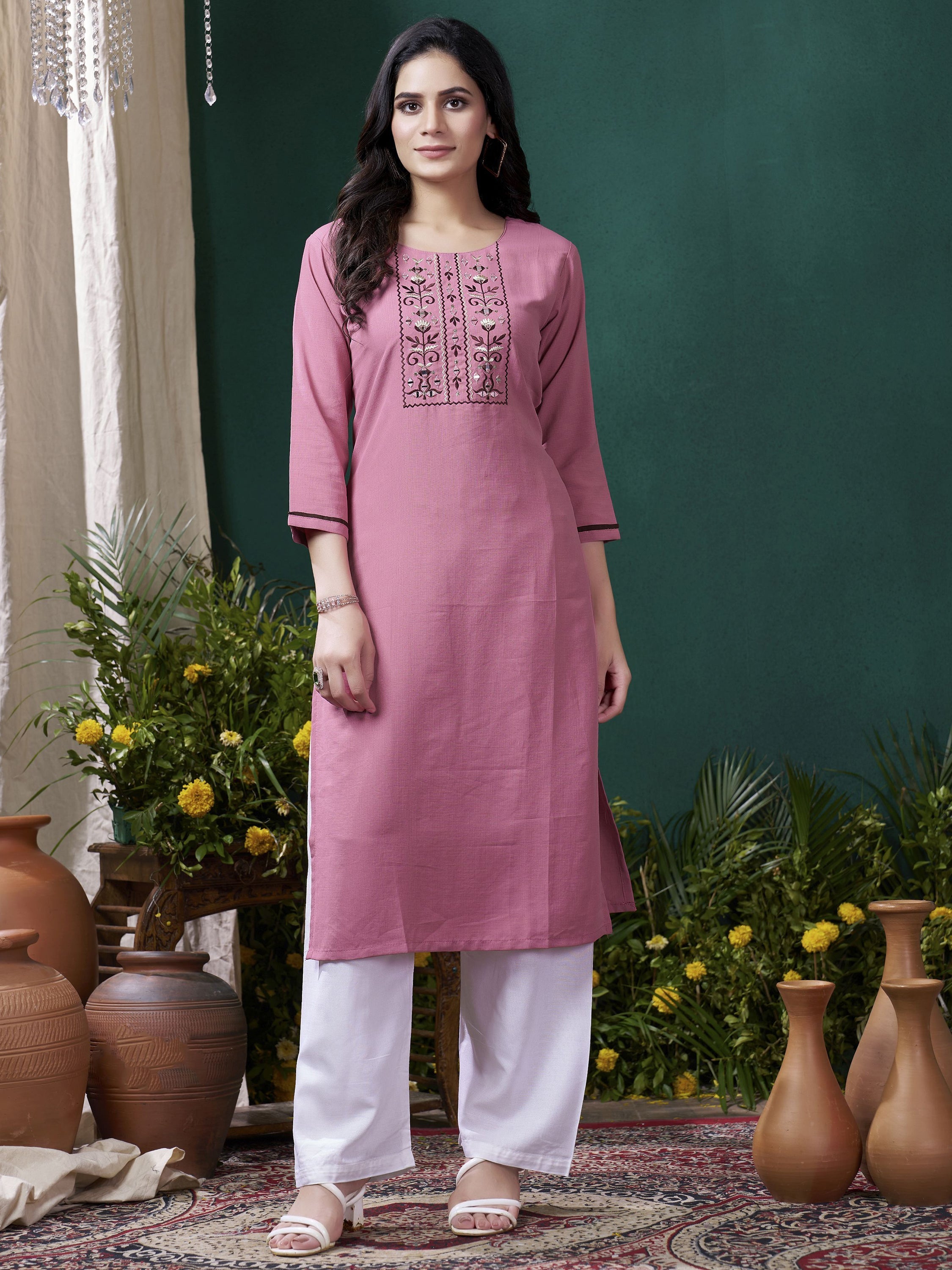 Elegantly designed mauve suit for family gatherings and festive occasions