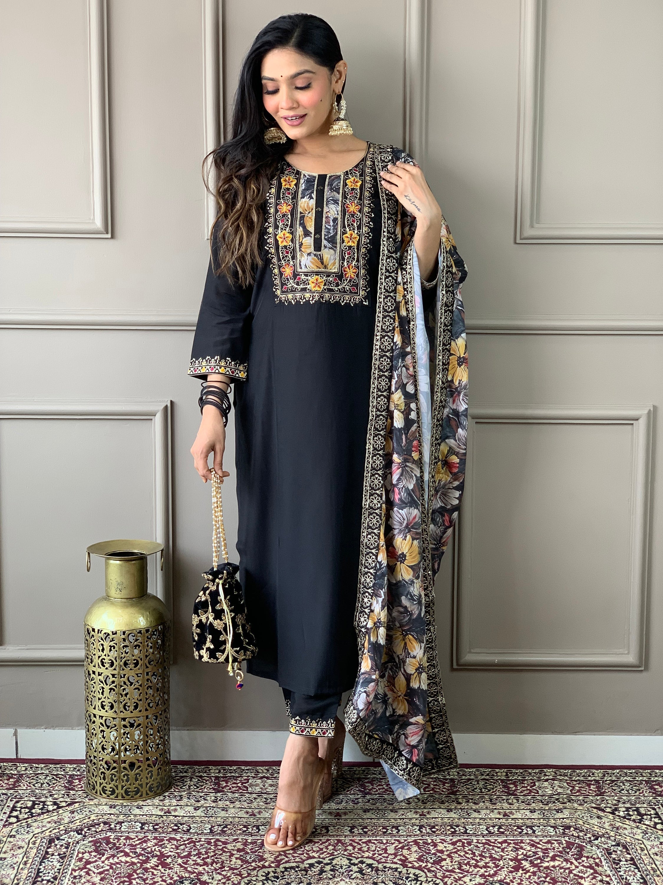 Black pant suit tailored for festivals, events, and special functions, embodying a seamless blend of tradition and modernity