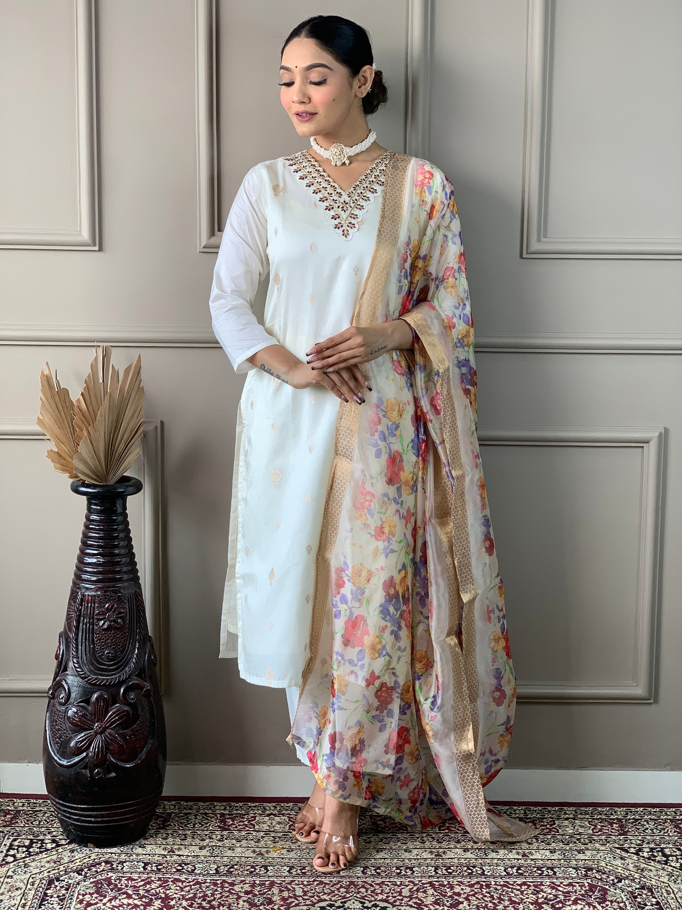 Elegant and sophisticated white festival wear pant suit with intricate embroidery