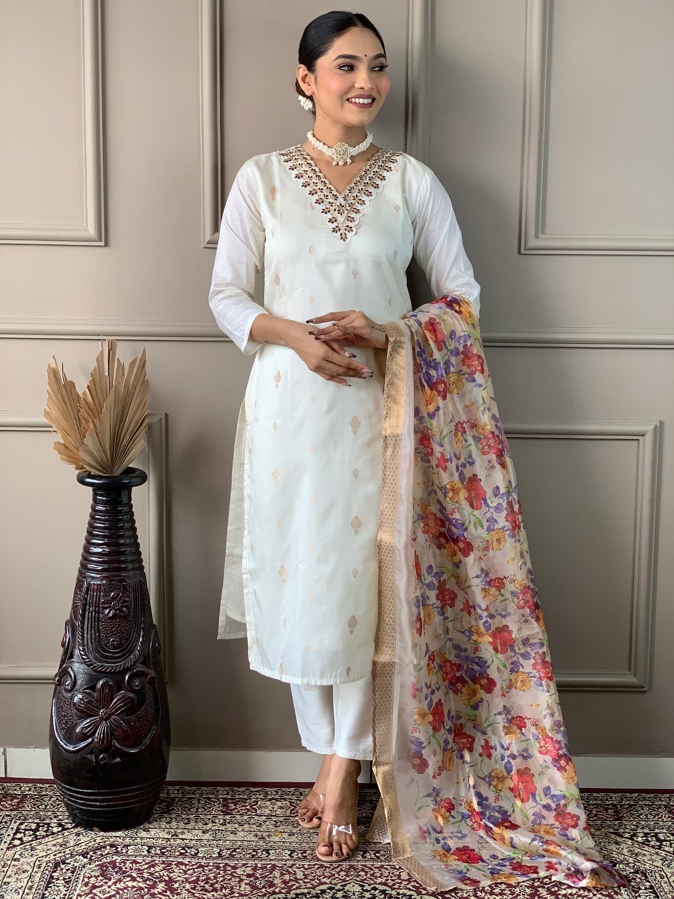 White embroidered nylon pant suit with matching pants and jacquard dupatta
