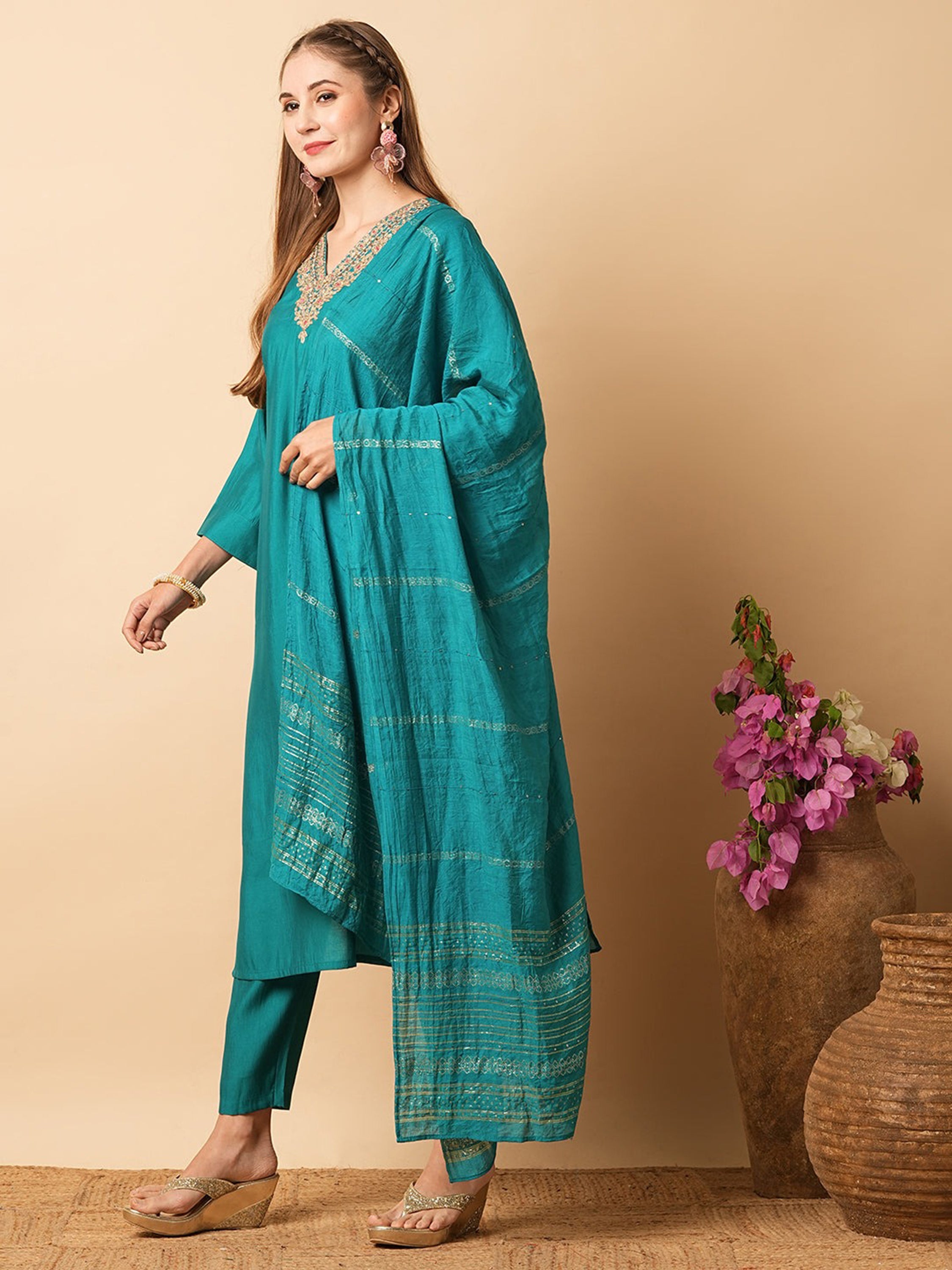 Stunning teal blue chanderi silk suit with intricate embroidered work