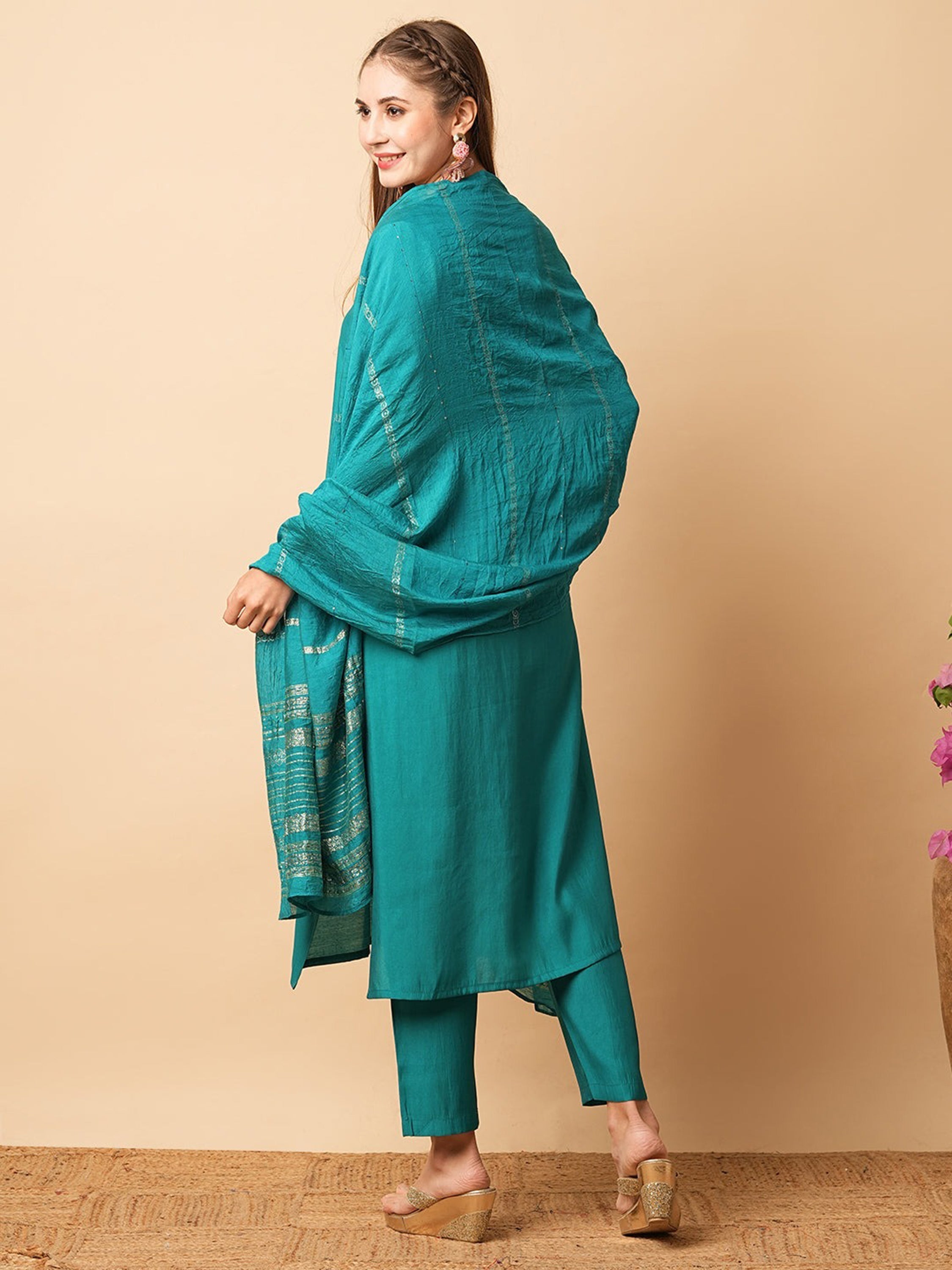Rich teal hue exudes a sense of calm sophistication