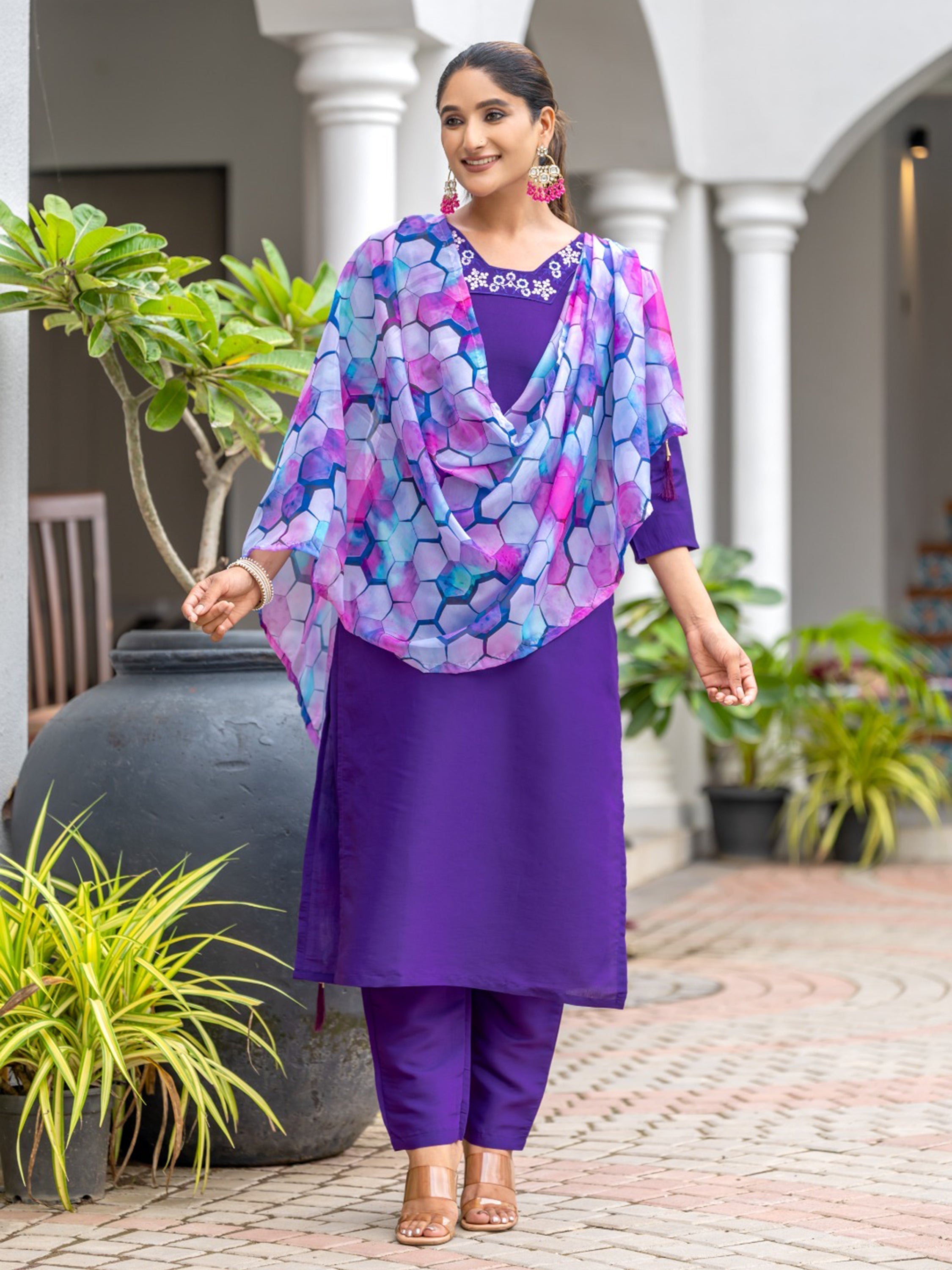 Delicate white organza dupatta adorned with charming print work