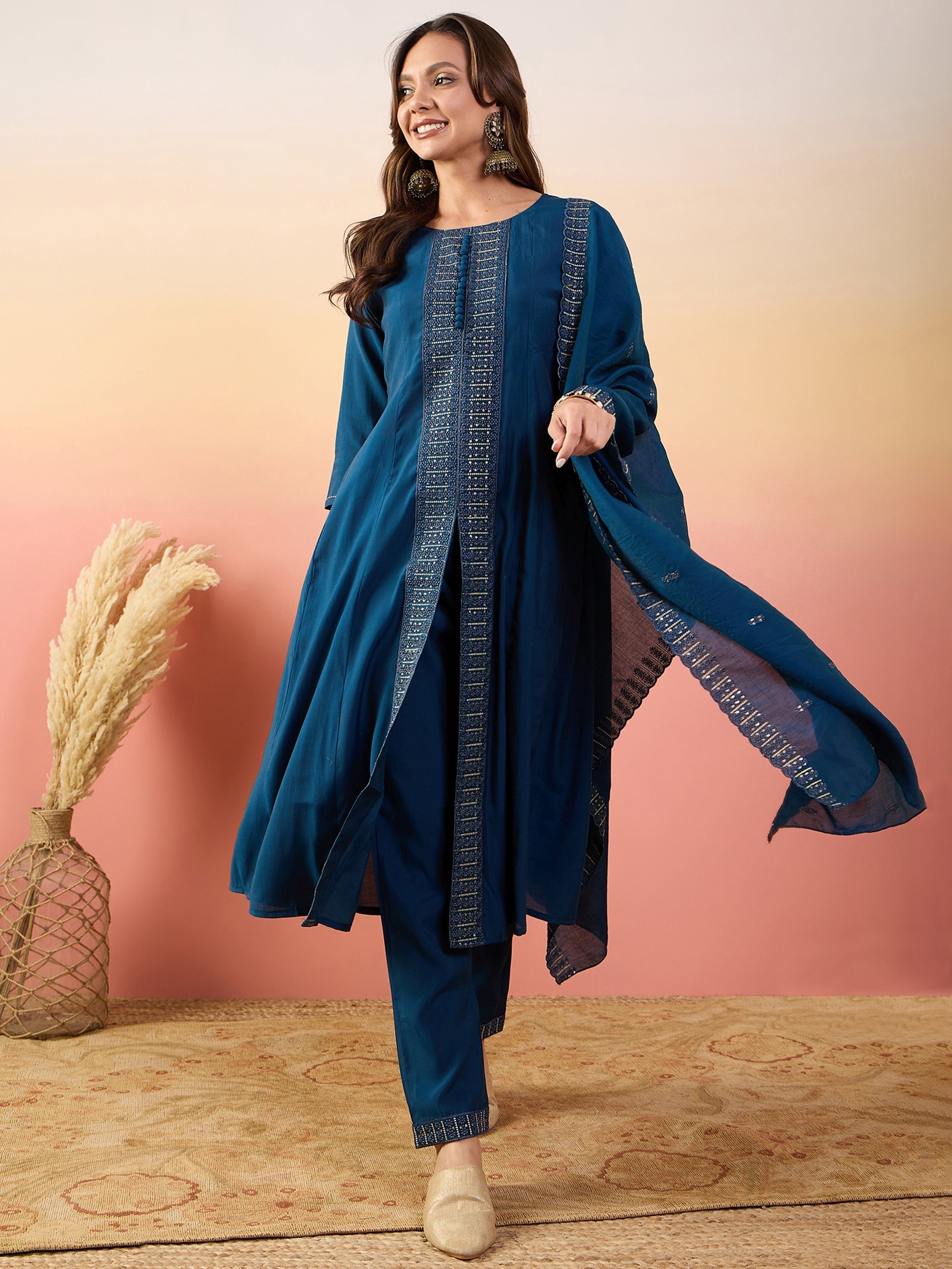 Beautifully designed blue silk suit with intricate embroidered work