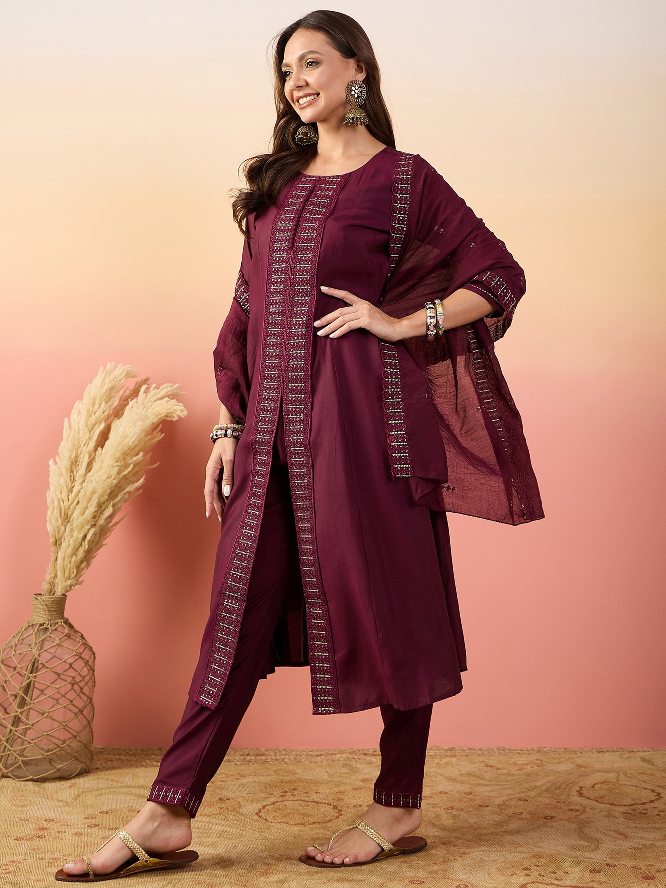 Maroon silk traditional pant suit with intricate embroidered work and dupatta