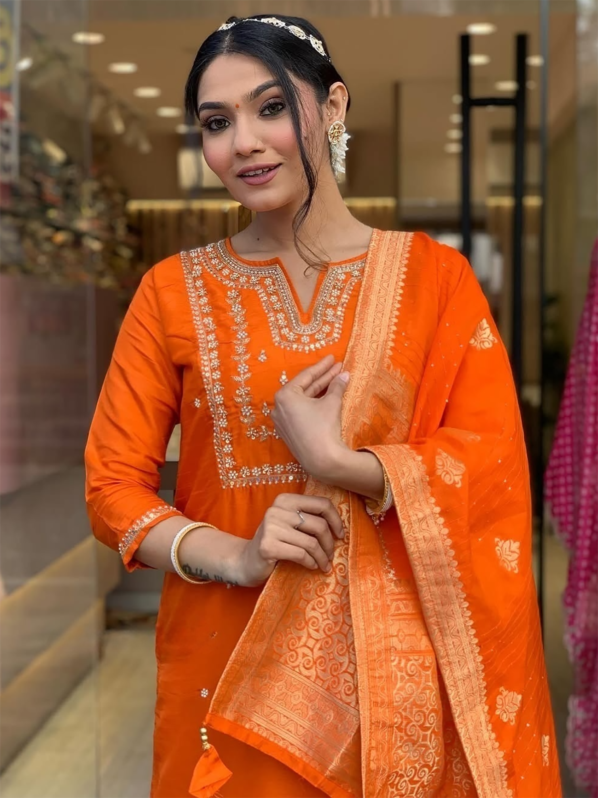 Stunning orange viscose pantsuit with intricate hand-embroidered work and sequin detailing