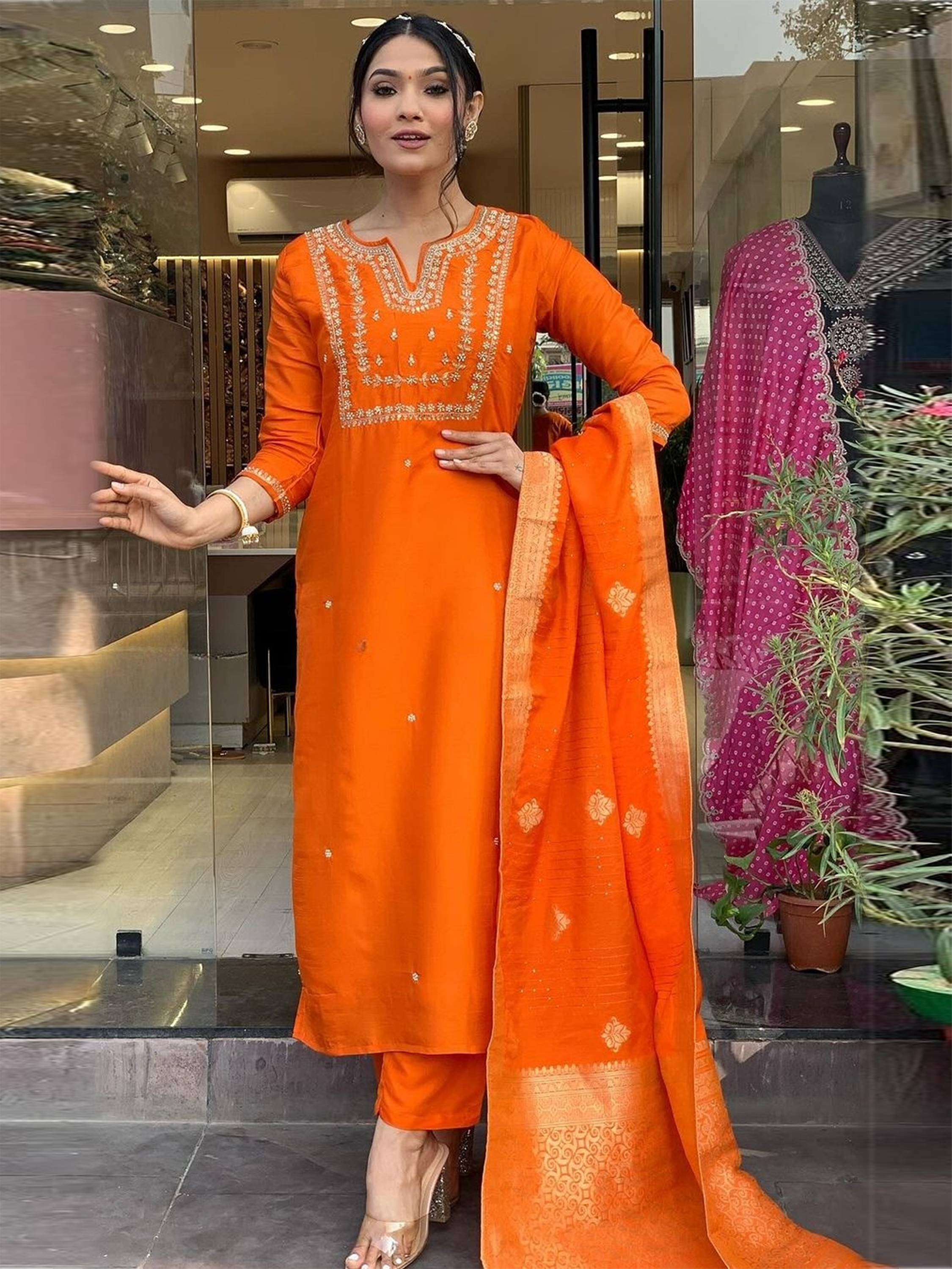 Vibrant orange pantsuit perfect for festivals, functions, and special events