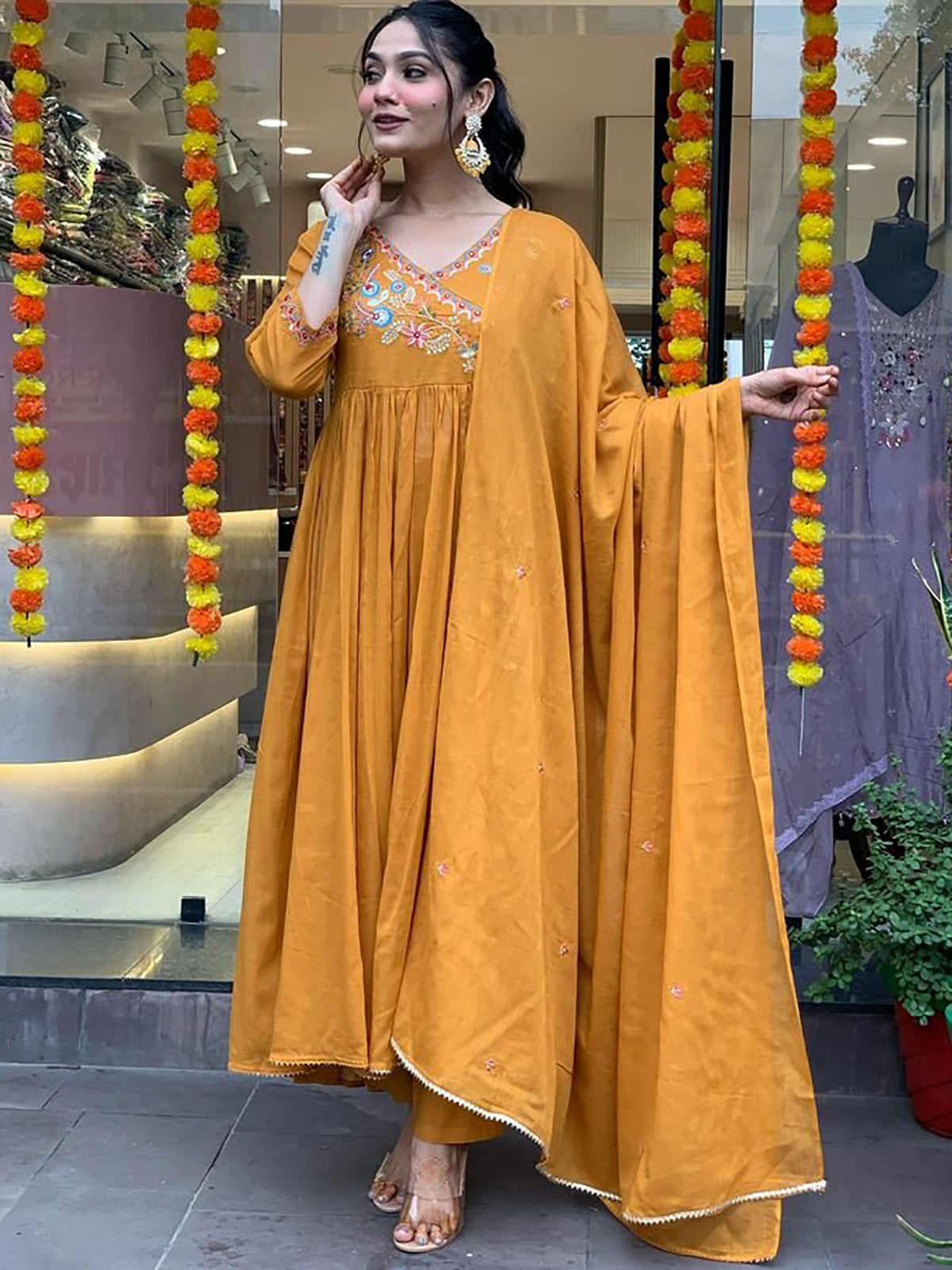 Mustard yellow embroidered pant suit with matching dupatta in viscose fabric