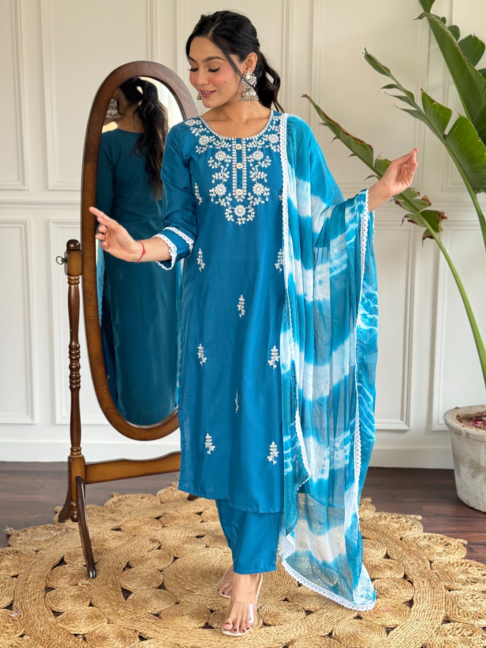 Charming blue pant suit with dupatta featuring intricate thread embroidery