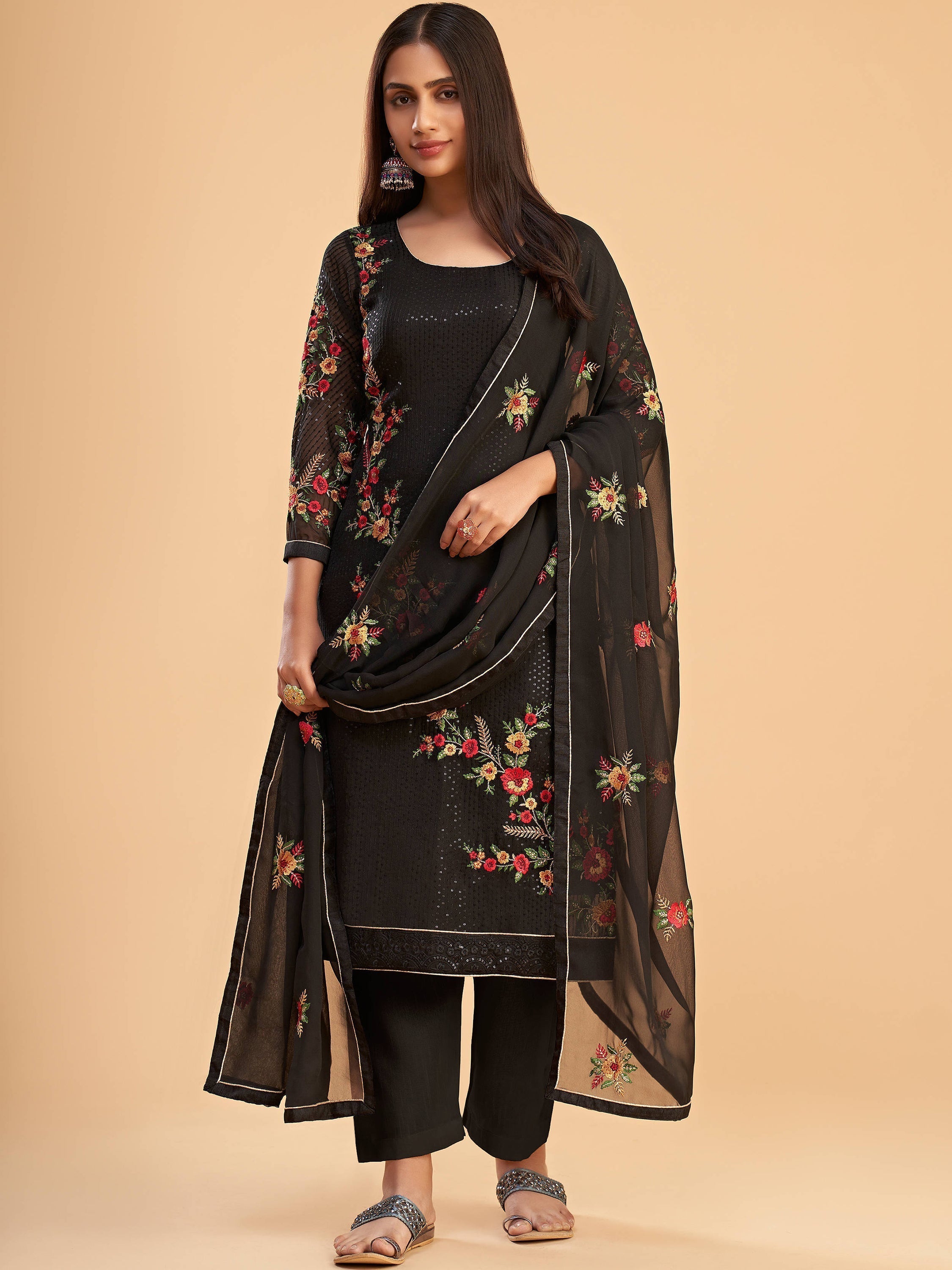 Fabulous Black Sequins Embroidered Georgette Salwar Suit with intricate detailing and elegant design