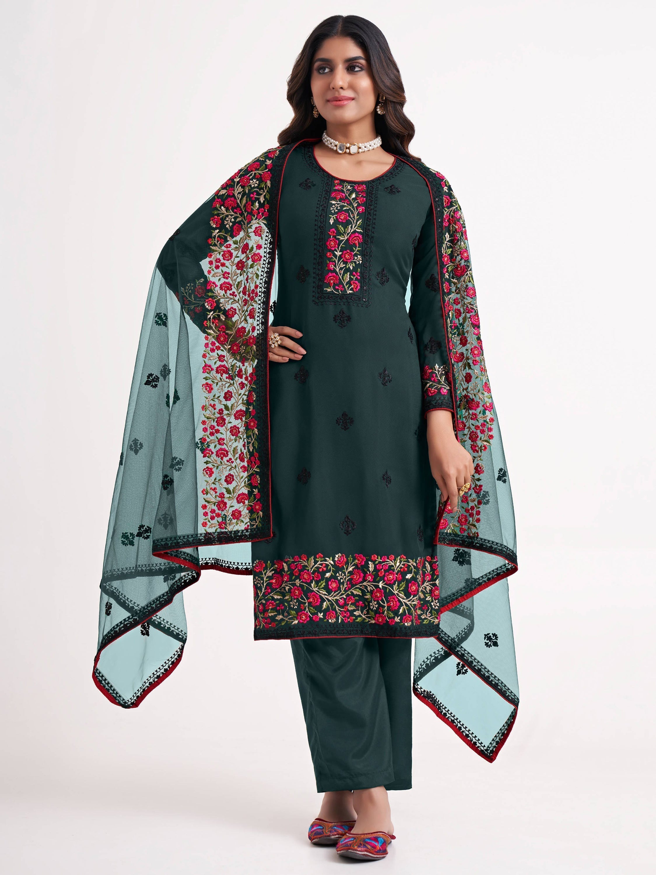Green suit with multi-thread embroidery, sequins work, and stonework
