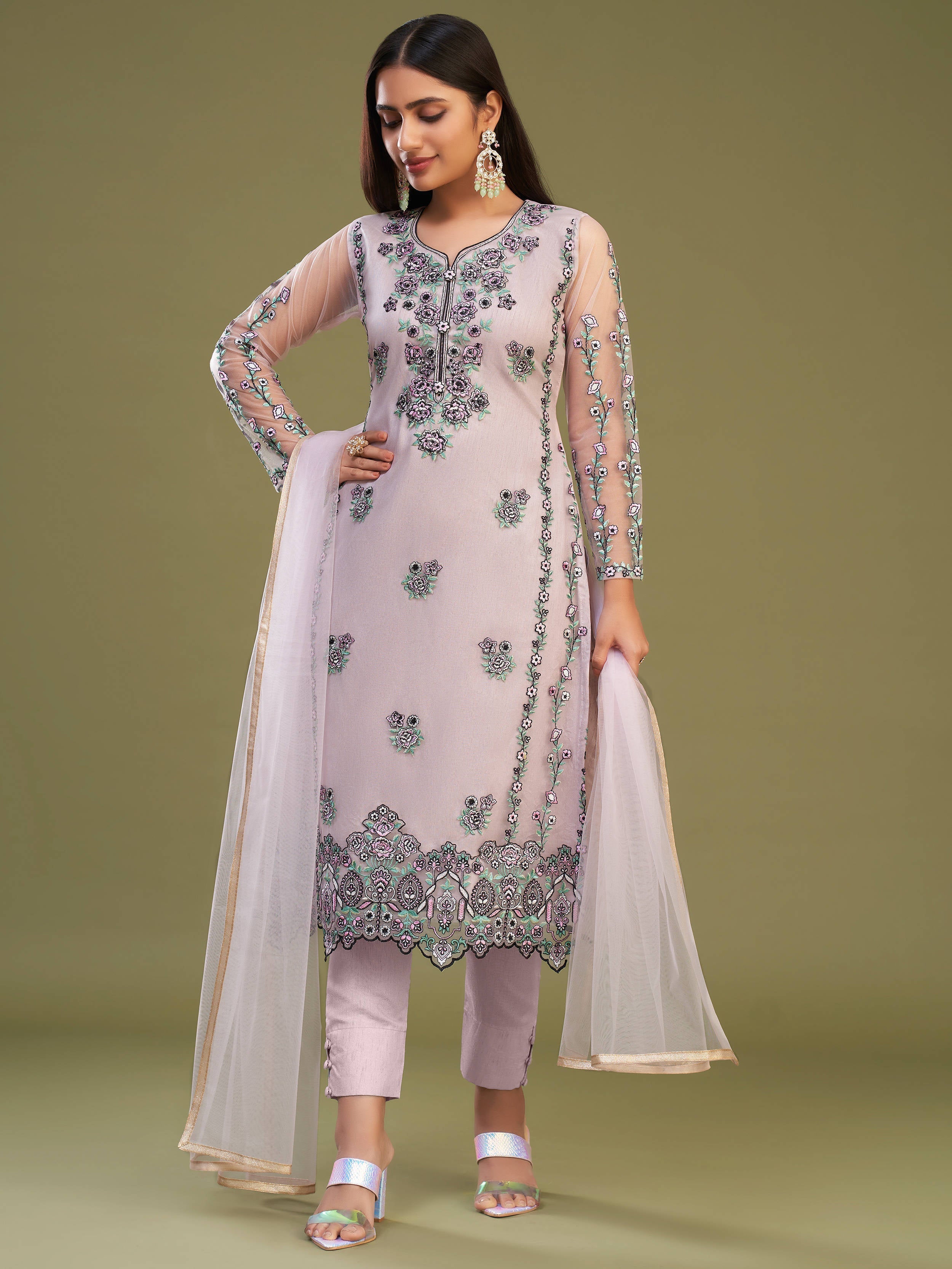 Attractive pink net embroidered designer salwar suit with matching dupatta and intricate detailing
