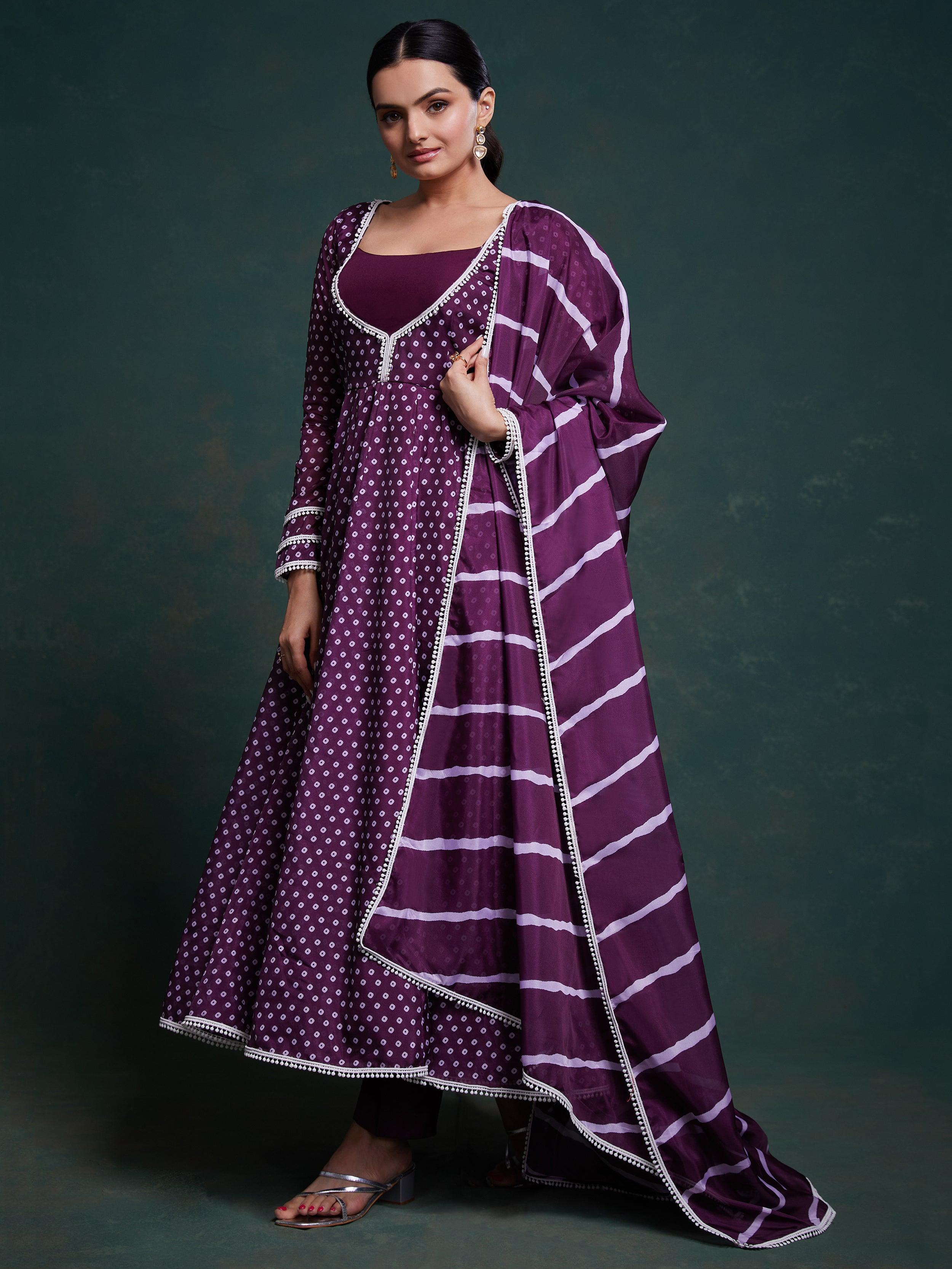 Fascinating purple printed organza festival wear salwar suit with intricate floral designs