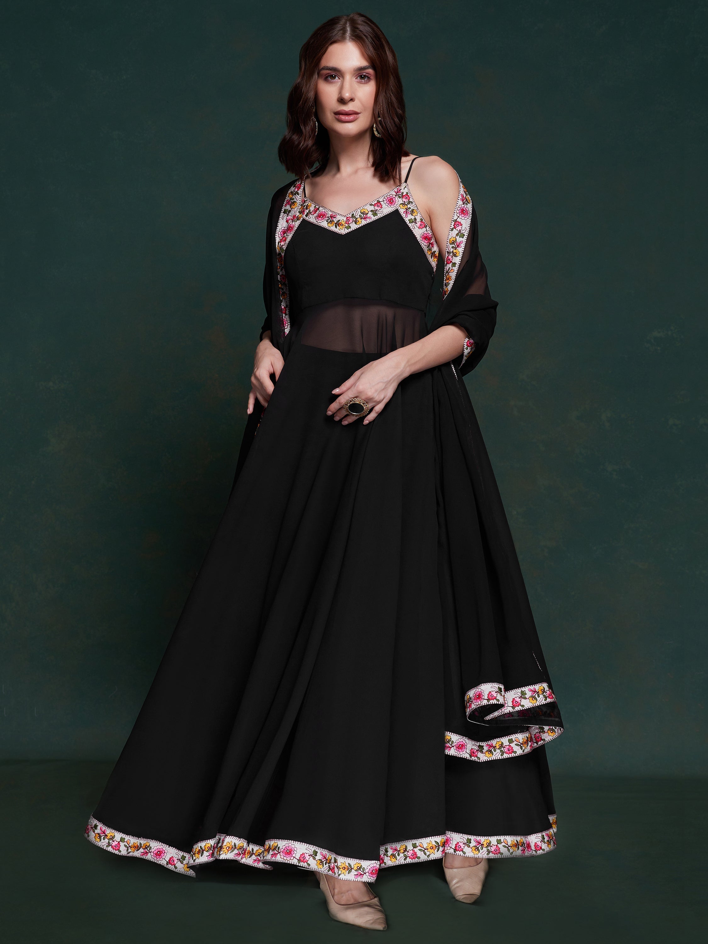 Elegant black georgette long suit with intricate lace work alt text