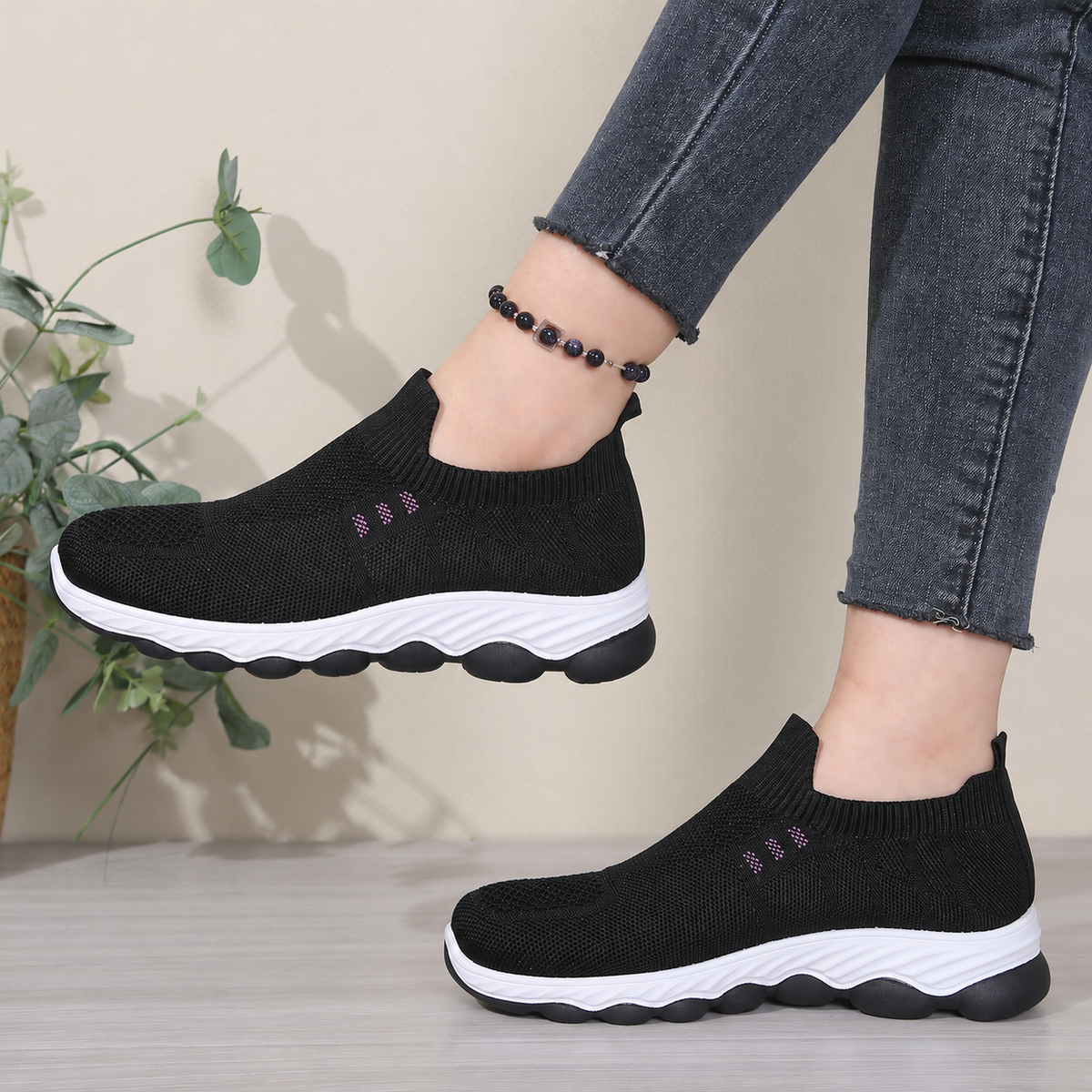 Black women's Avenleigh Knit Slip-On Sneakers by Bootara with breathable mesh, round toe, casual slip-on style for comfortable everyday wear.