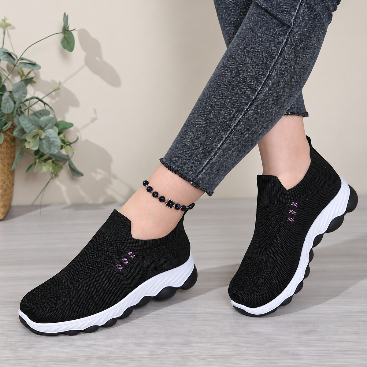 Black Women's Avenleigh Knit Slip-On Sneakers by Bootara with breathable mesh, round toe, casual design, available in US sizes 5-10.5.