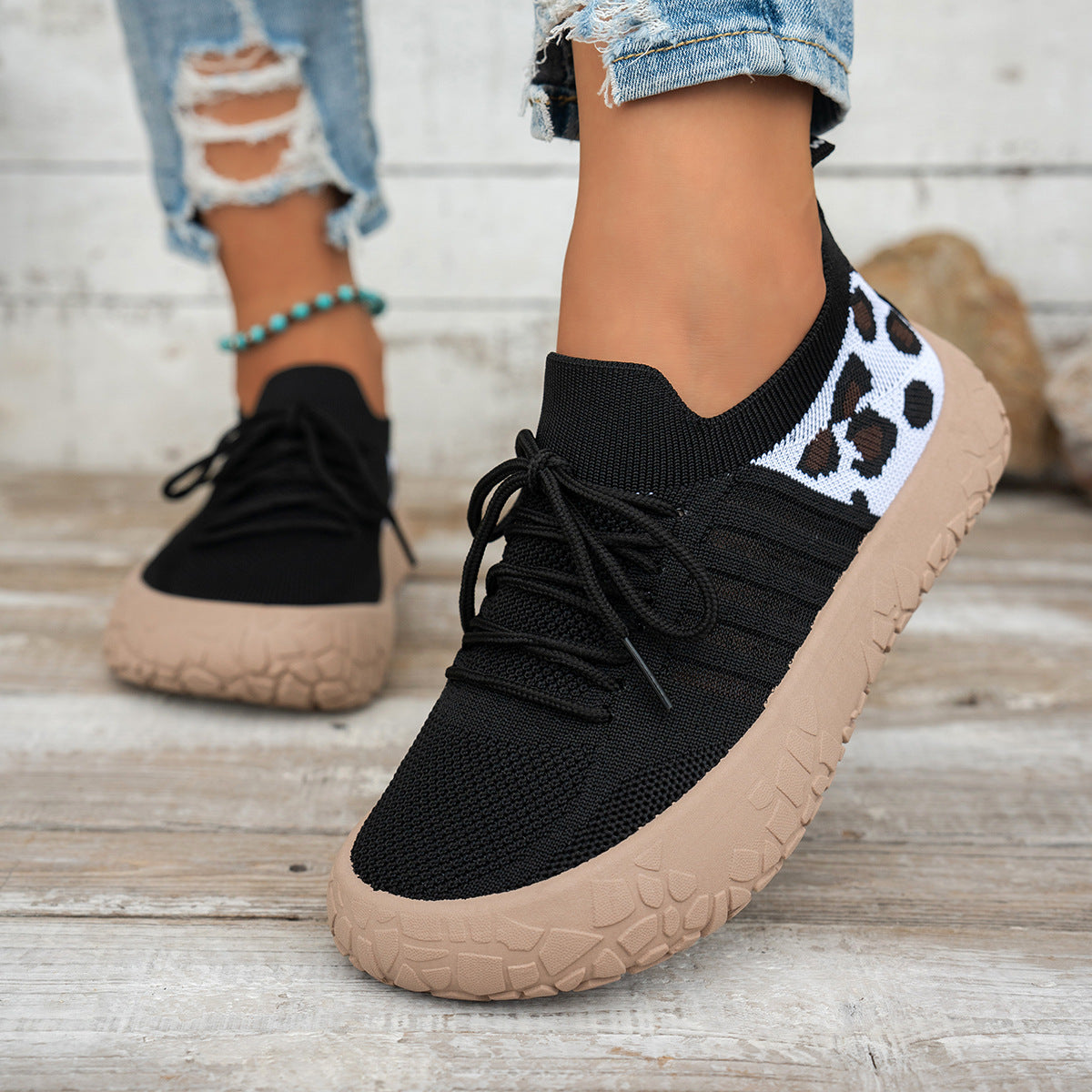Women's Cerynna Knit Sneakers by Bootara featuring leopard print detail, slip-on design, chunky sole, in black.