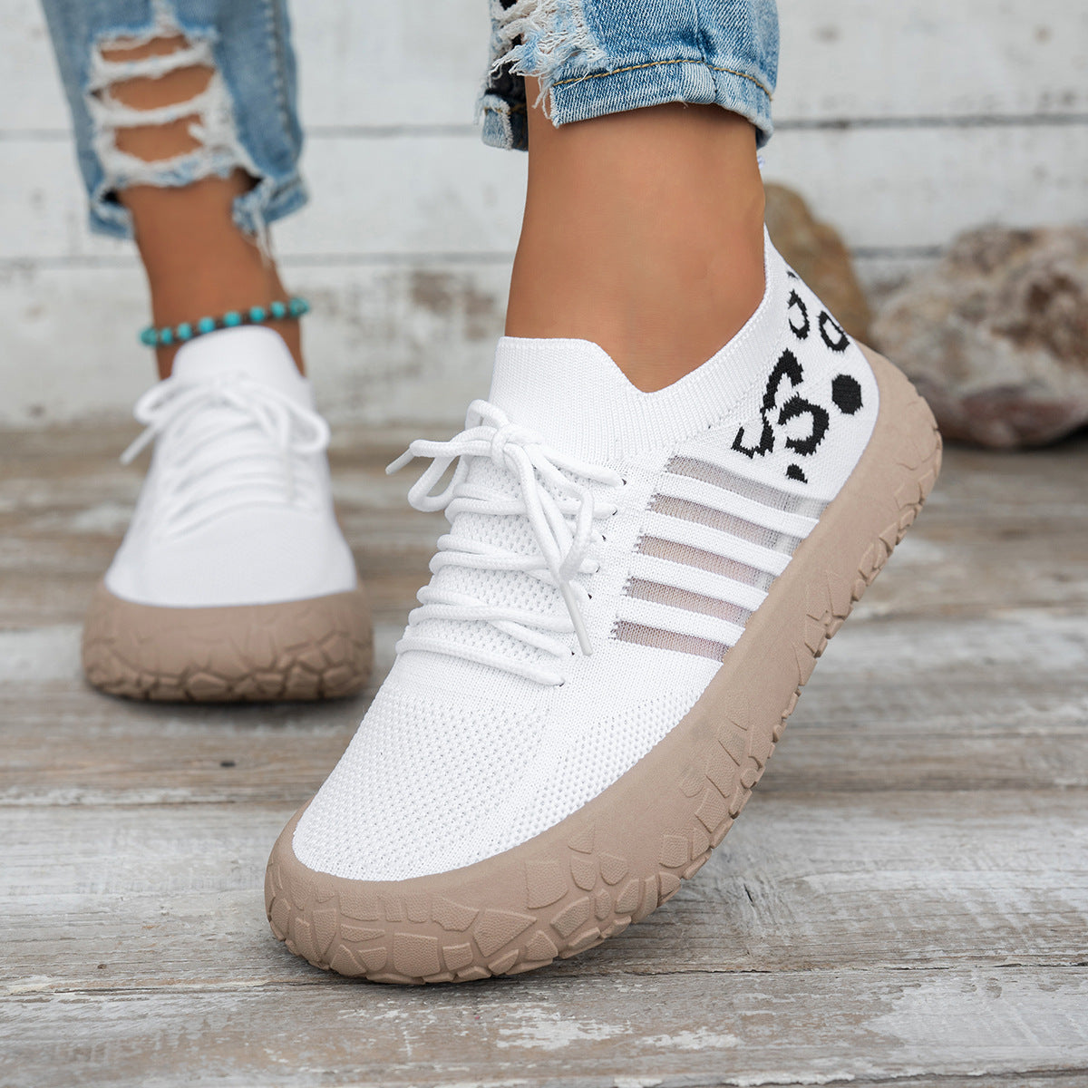 Women's Cerynna Knit Sneakers by Bootara featuring leopard detail, slip-on style, chunky sole, in white, available in US sizes 5-10.5.