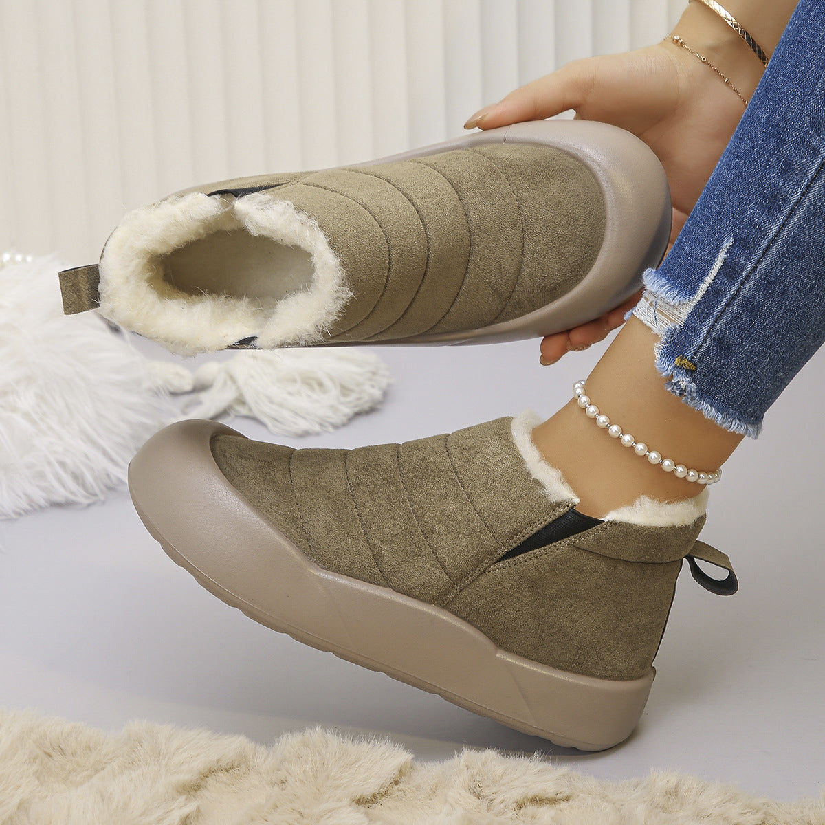 Women's Sorielle Green Winter Ankle Boots by Bootara with plush lining, quilted detail, slip-on style, and rubber sole.