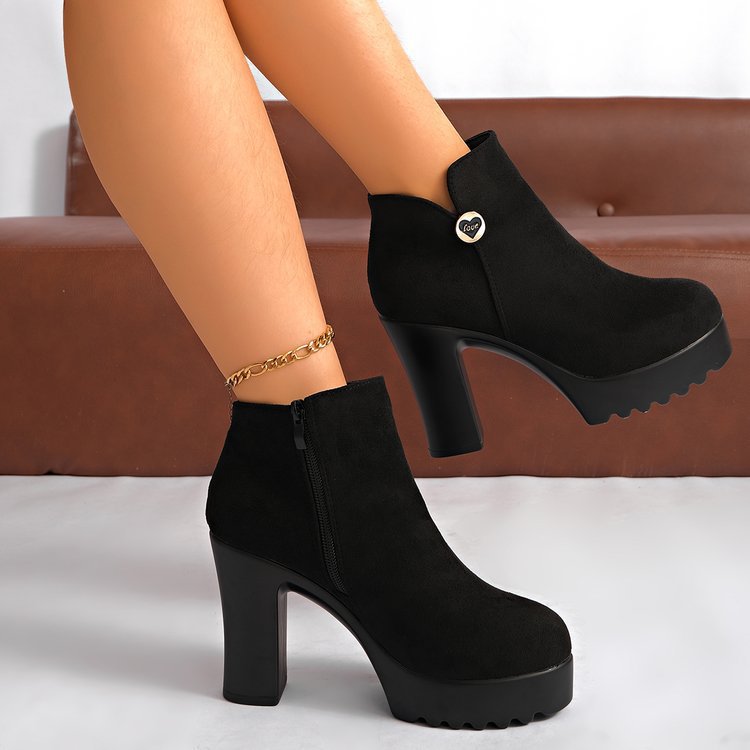 Black women's Veylisse platform ankle boots by Bootara with round toe, side zip, heart detail, and high block heel.