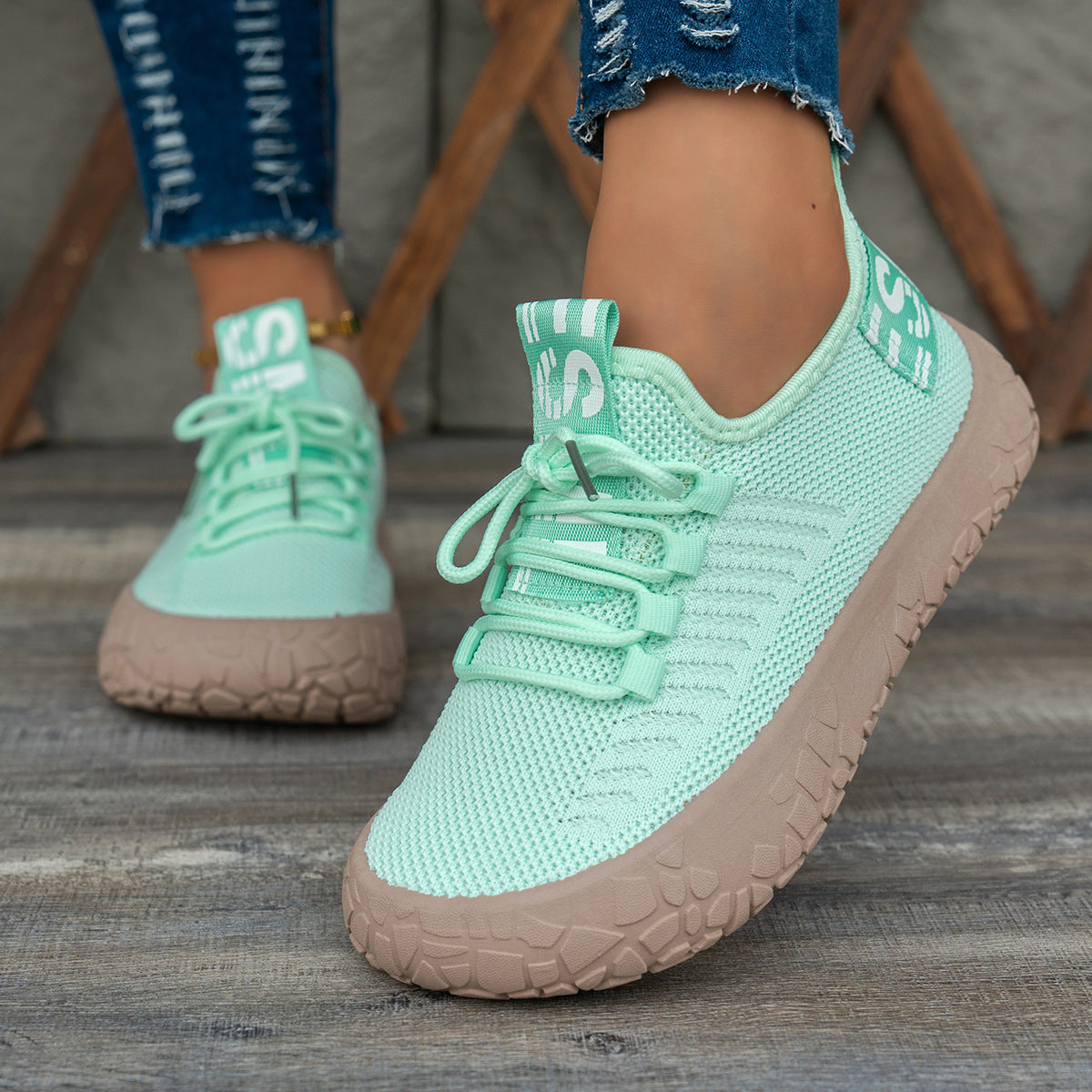 Light green Women's Kestielle Knit Sneakers by Bootara with slip-on design, laces, and chunky textured sole, available in US sizes 5-10.5.