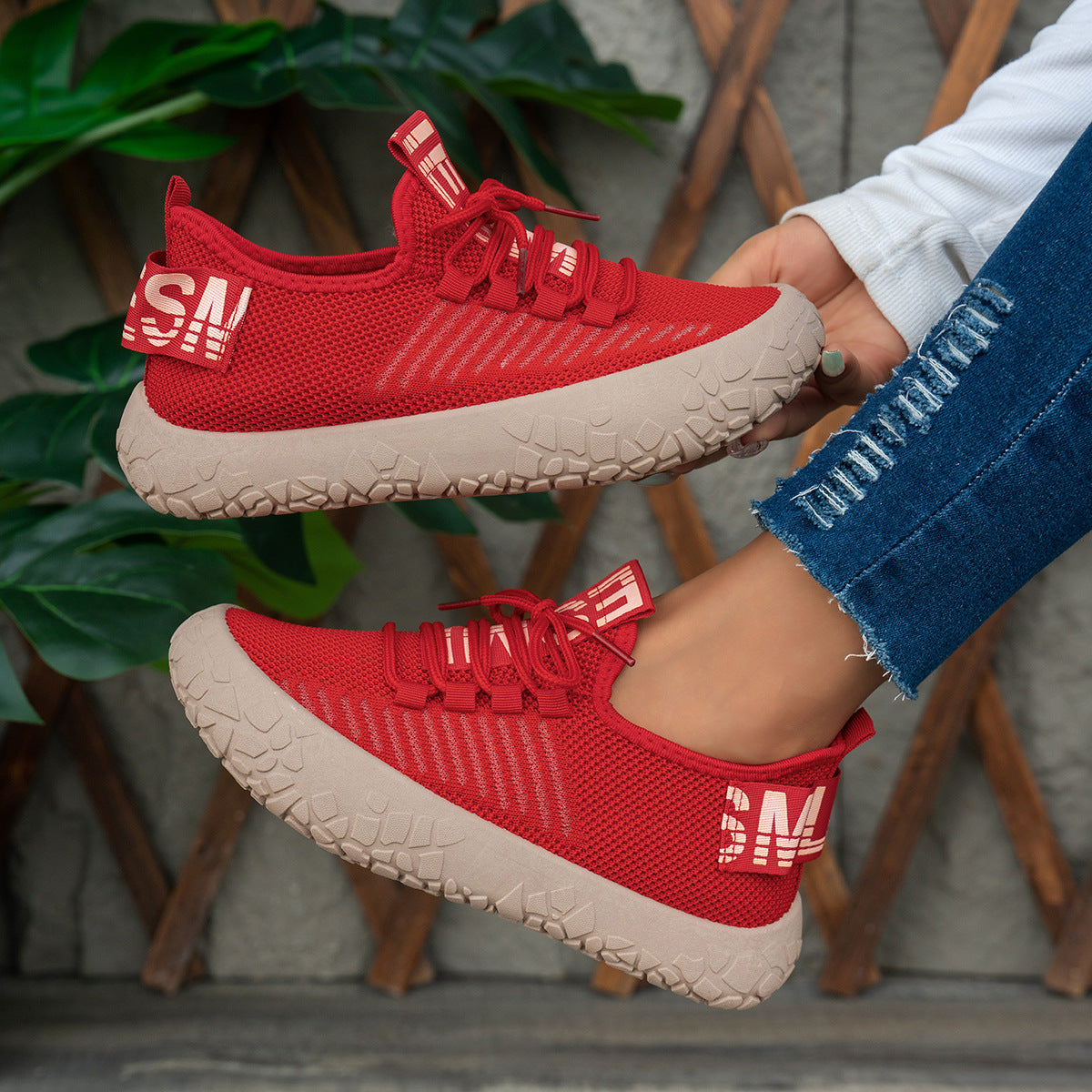 Women's red Kestielle Knit Sneakers by Bootara, breathable slip-on shoes with laces and chunky textured sole, size US 8.