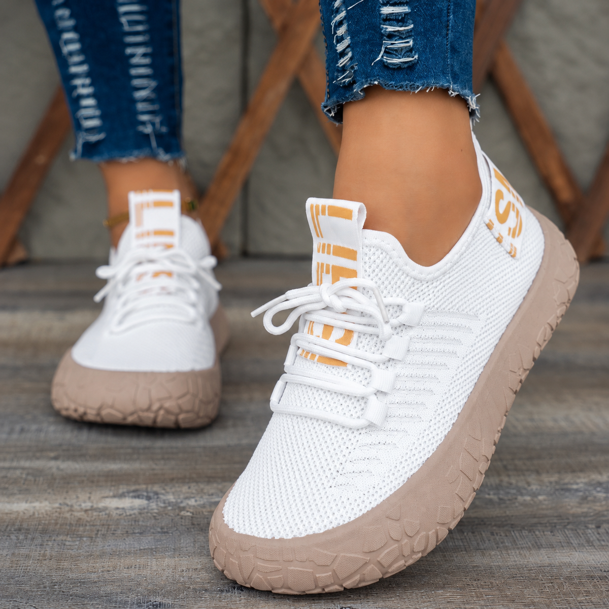 Women’s Kestielle knit sneakers by Bootara featuring breathable slip-on design, laces, and chunky textured sole, US sizes 5-10.5.