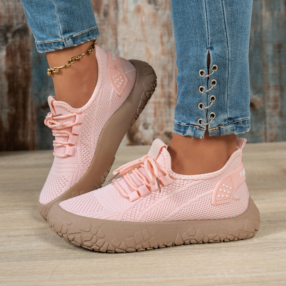 Pink Women's Thessalie Knit Sneakers by Bootara with breathable slip-on design, laces, and textured chunky sole, US size 8.
