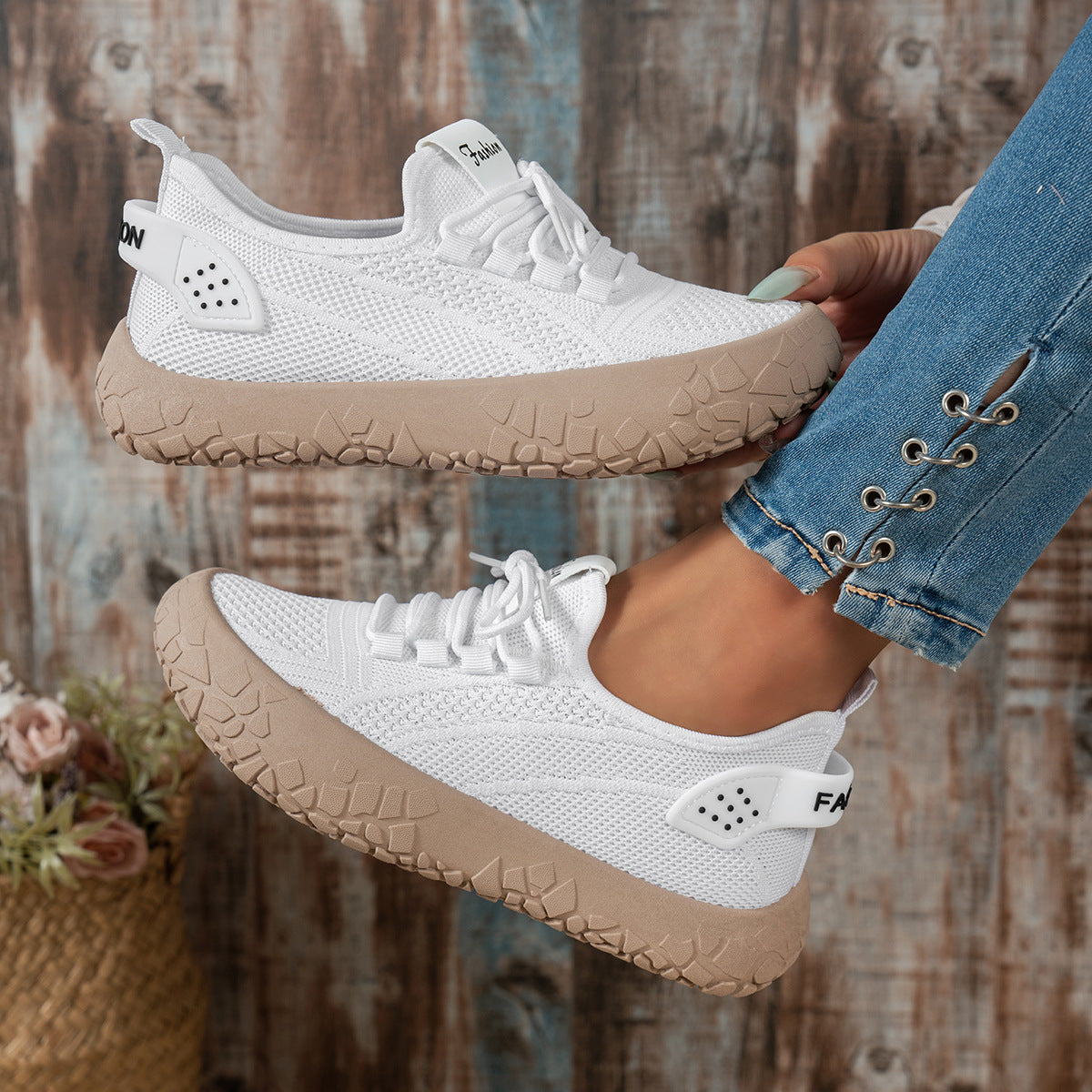 White Women's Thessalie Knit Sneakers by Bootara with slip-on design, laces, and textured chunky sole, available in US sizes 5 to 10.5.