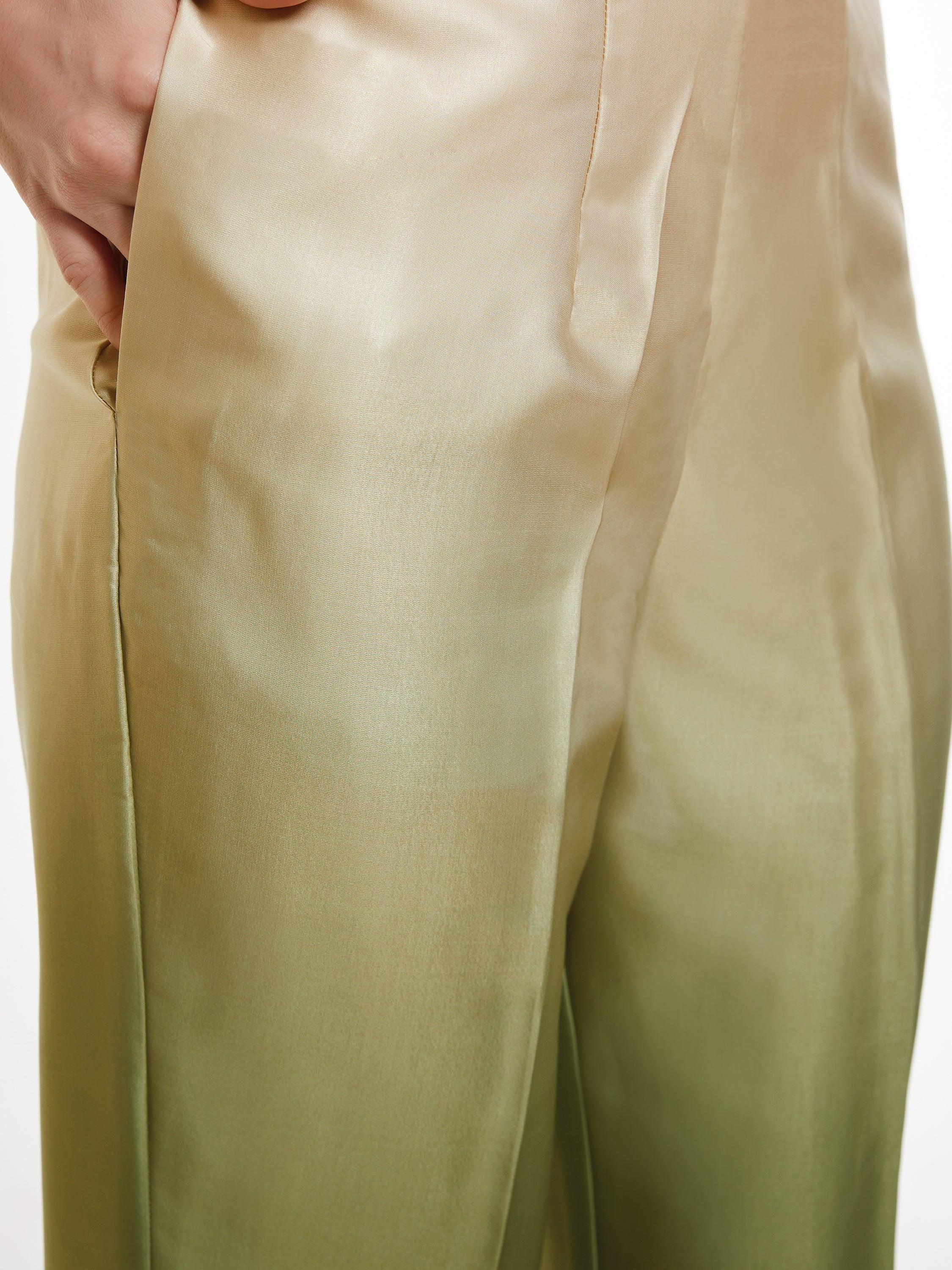 Intricate printed work on the ombre green designer asymmetrical kurta adds a touch of sophistication