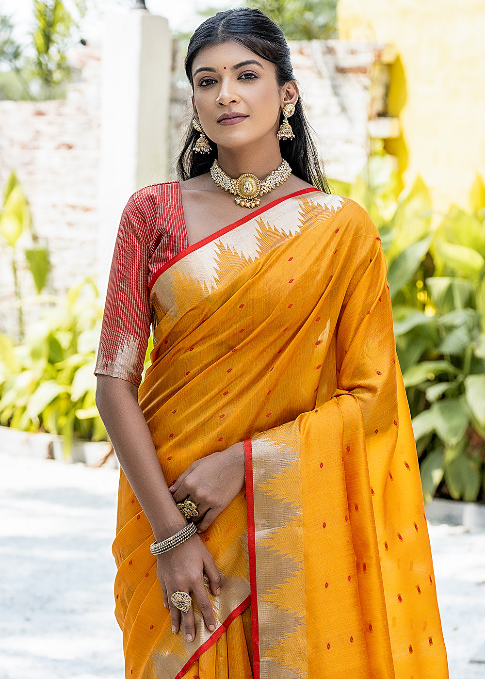Saffron Yellow Zari Woven Triangle Border Raw Silk Saree with Butti Overall - qivii