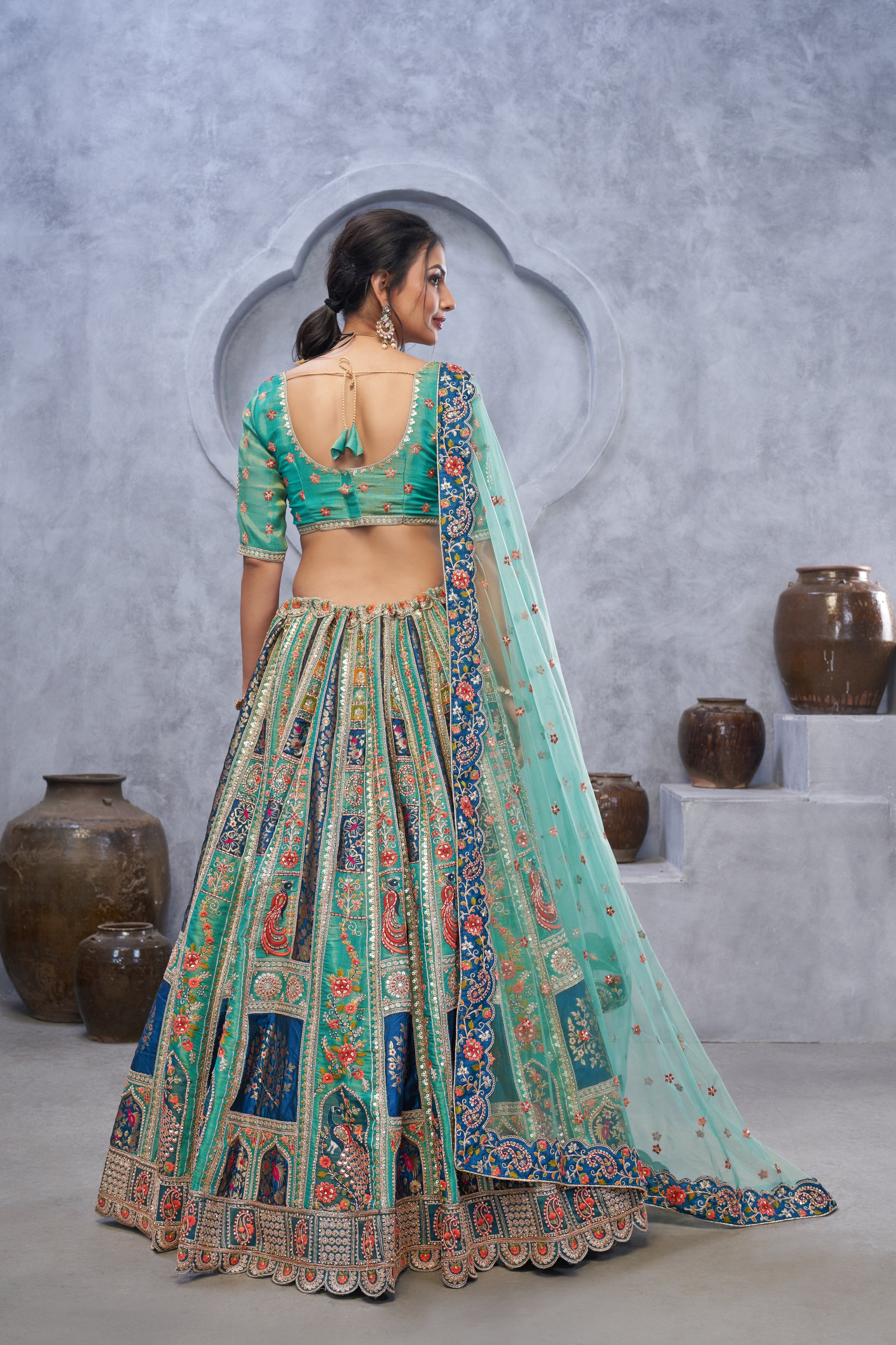The Bagh Collection: Graceful Green Lehenga with Thread and Sequin Embellishments - qivii