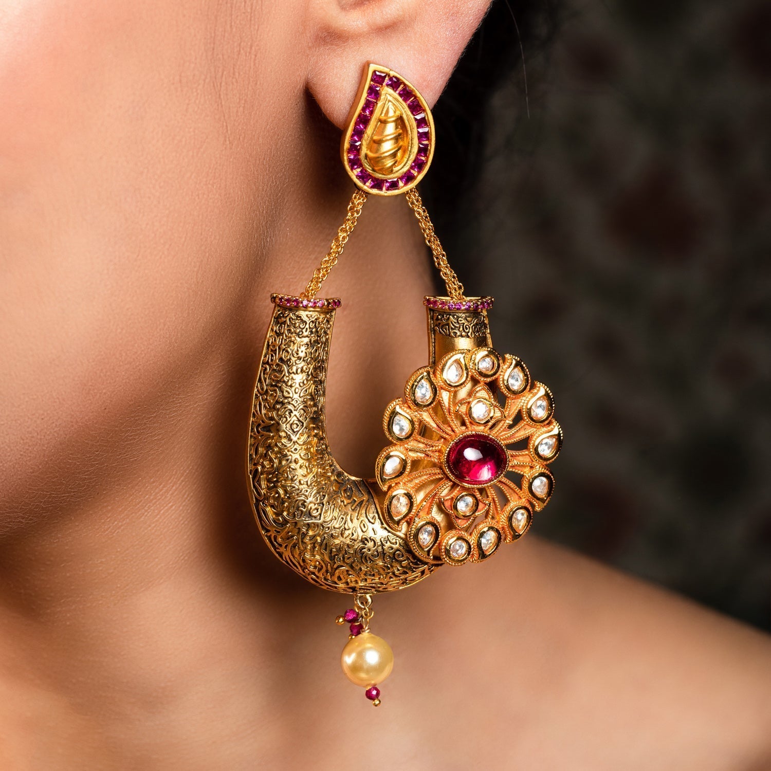 Beautifully designed gold plated kundan earrings