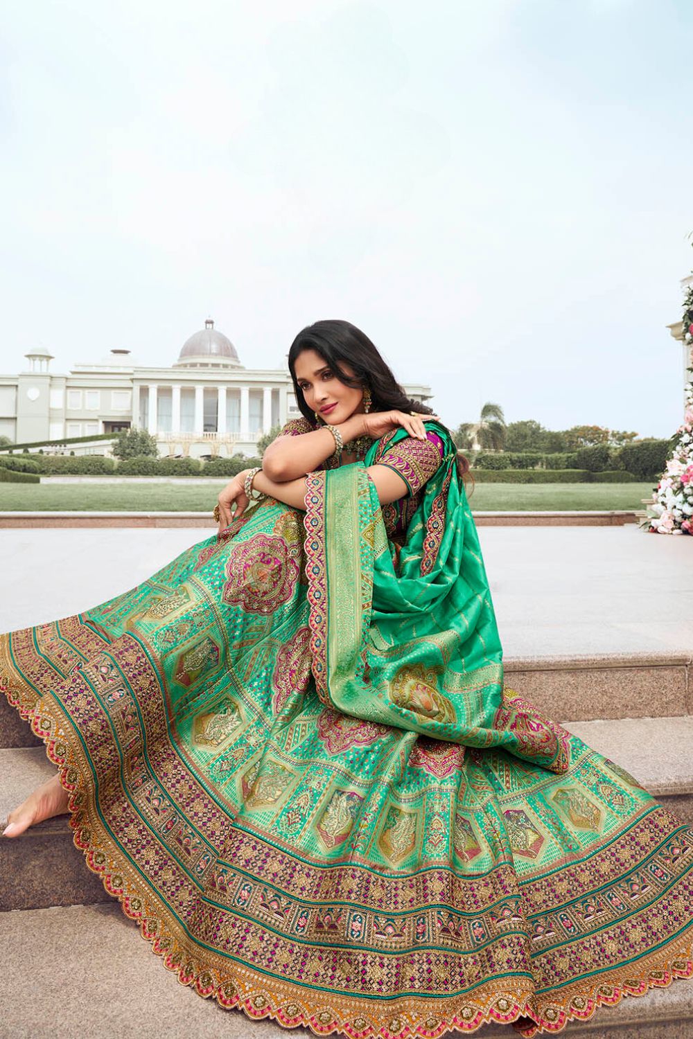 Luxurious Green and Pink Banarasi Silk Lehenga with detailed Zarkan work