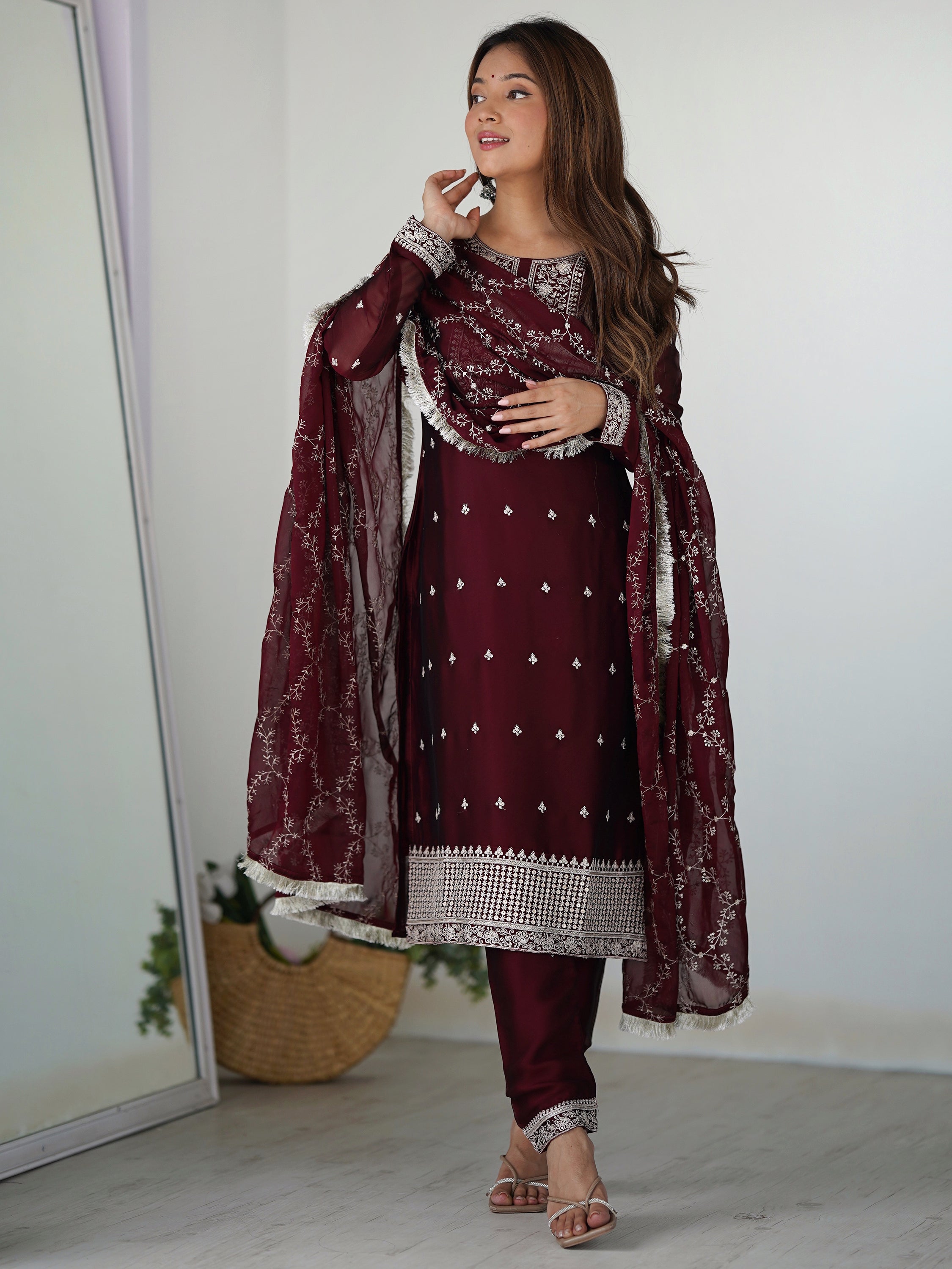 Maroon silk pant suit with intricate thread work and matching dupatta for festivals