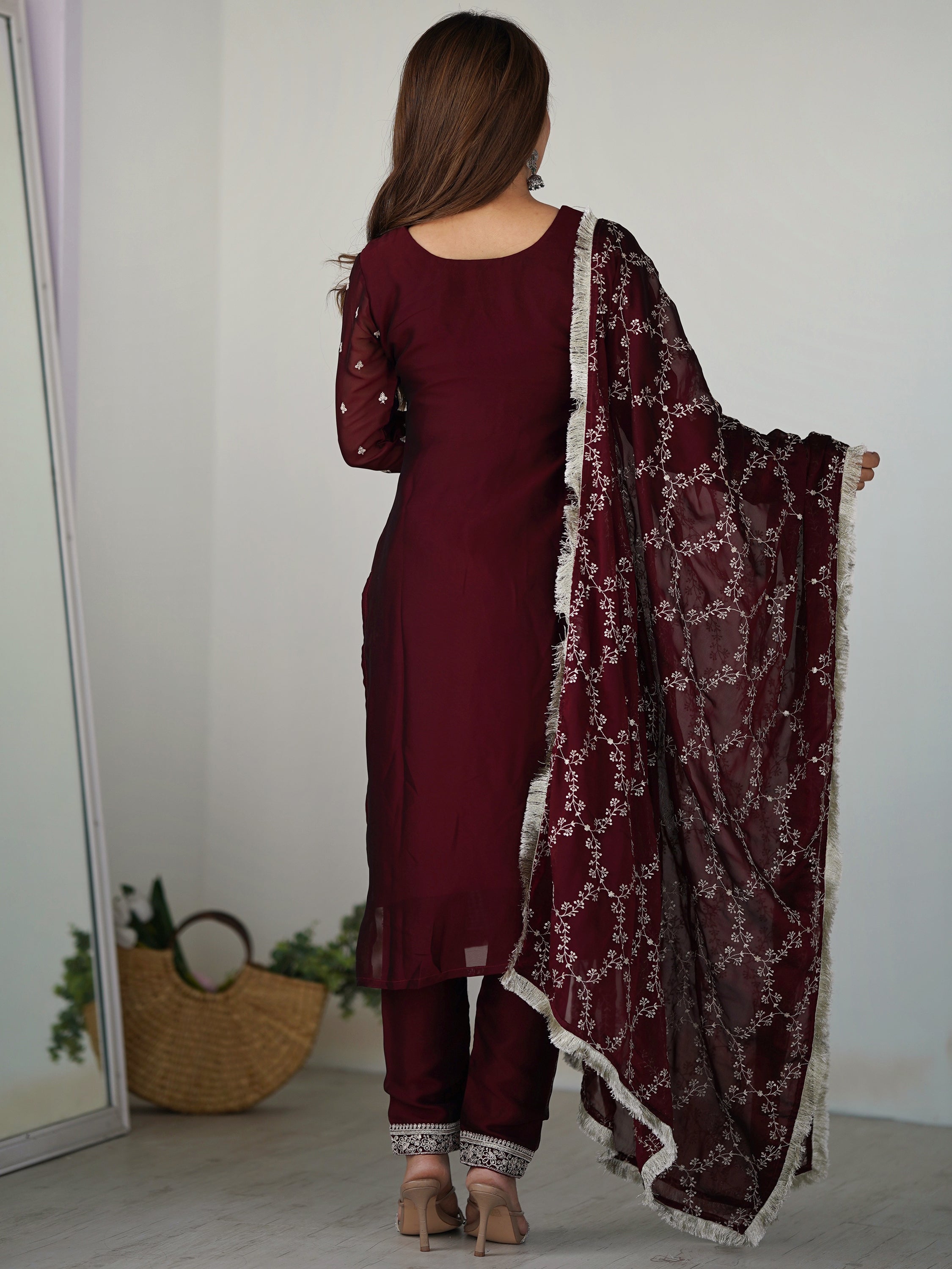 Maroon silk pant suit with intricate thread work and matching dupatta