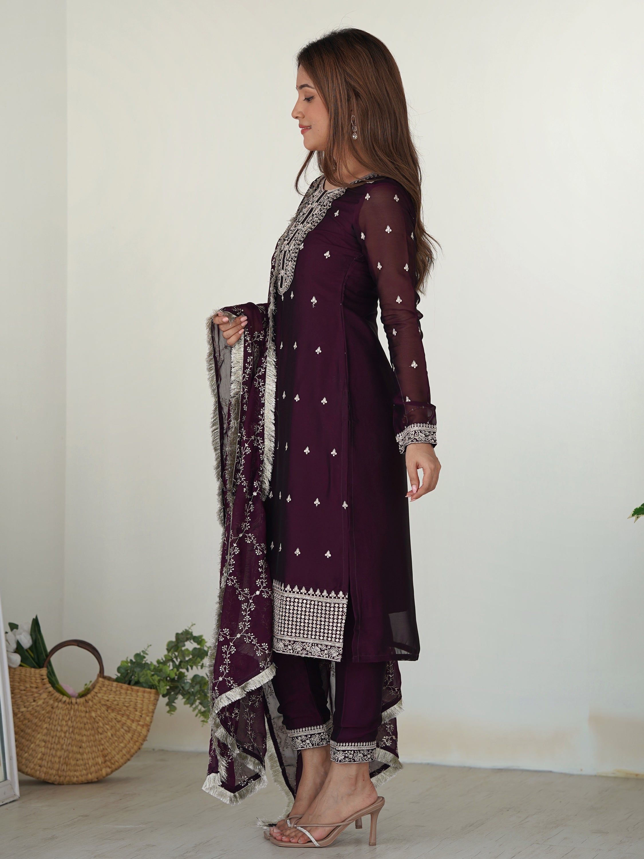 Exquisite purple silk pant suit with intricate embroidery and matching dupatta