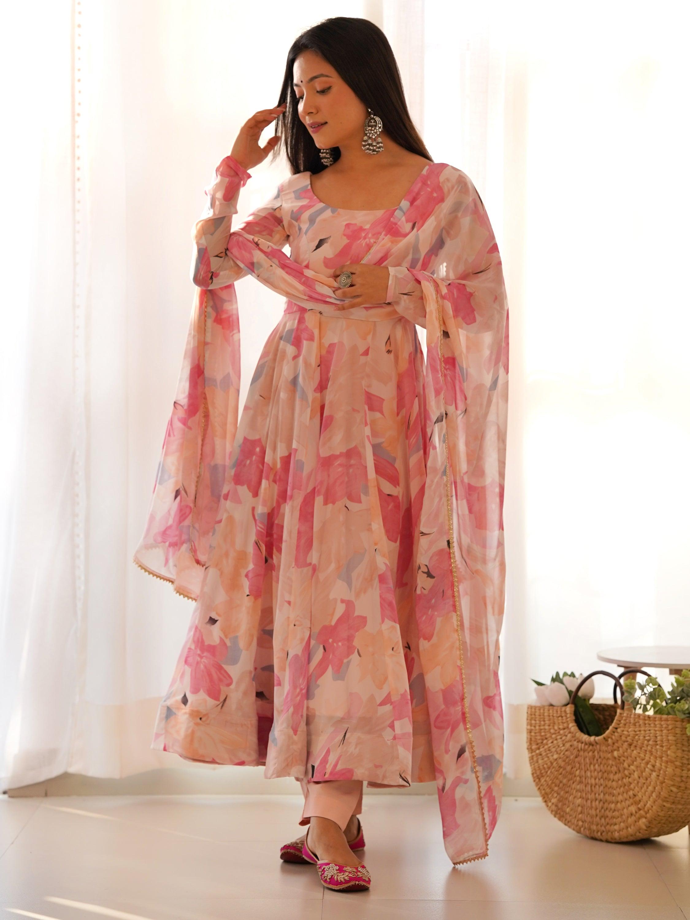 Dazzling Peach Floral Printed Georgette Traditional Anarkali Suit with intricate embroidery and flowing silhouette for elegant traditional wear