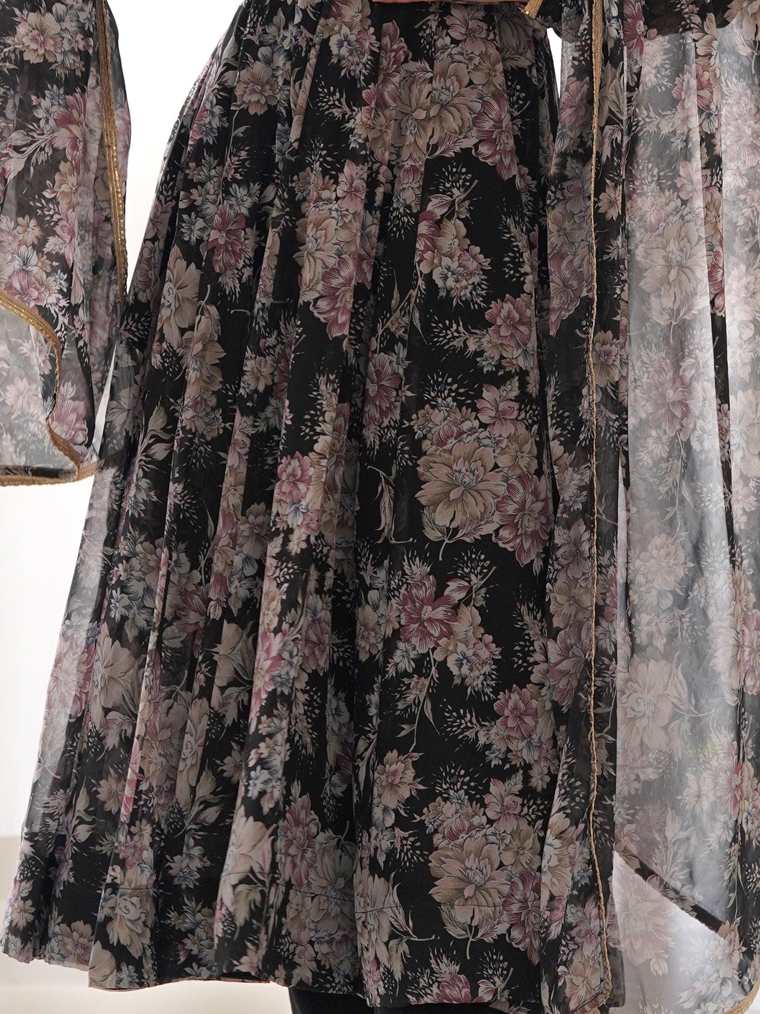 Timeless elegance with contemporary charm in a black floral printed pant suit