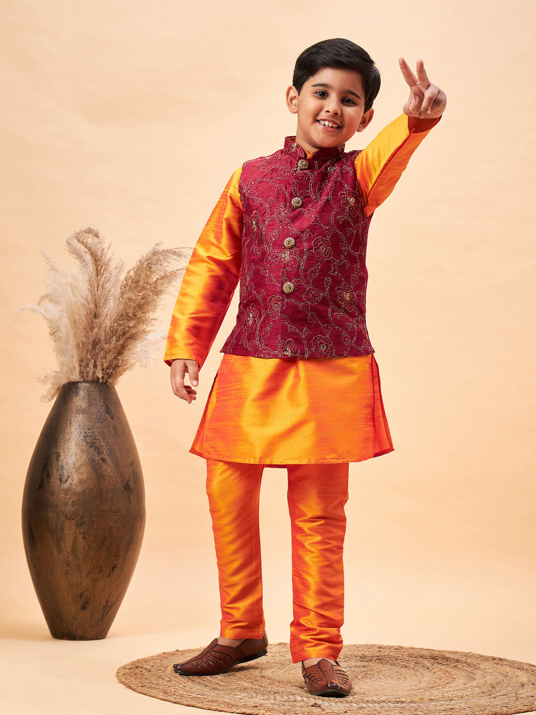 VASTRAMAY Boy's Maroon Nehru Jacket With Orange Kurta And Pyjama Set - qivii