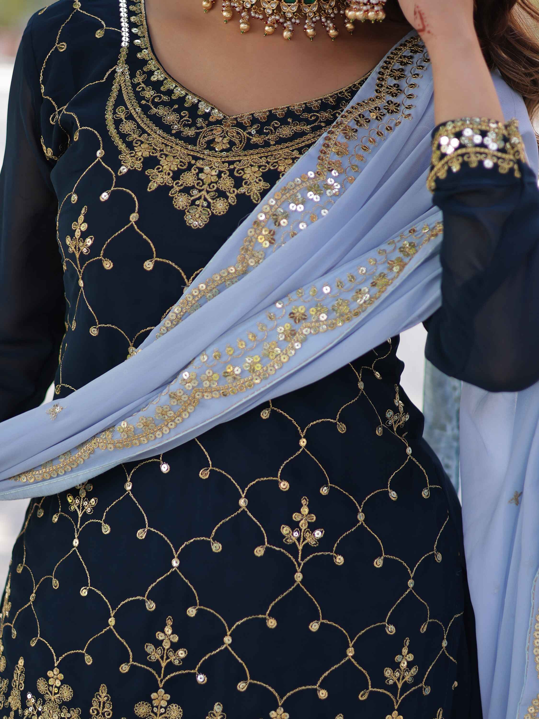 Faux blooming sharara boasts exquisite embroidery and comfortable elastic waist