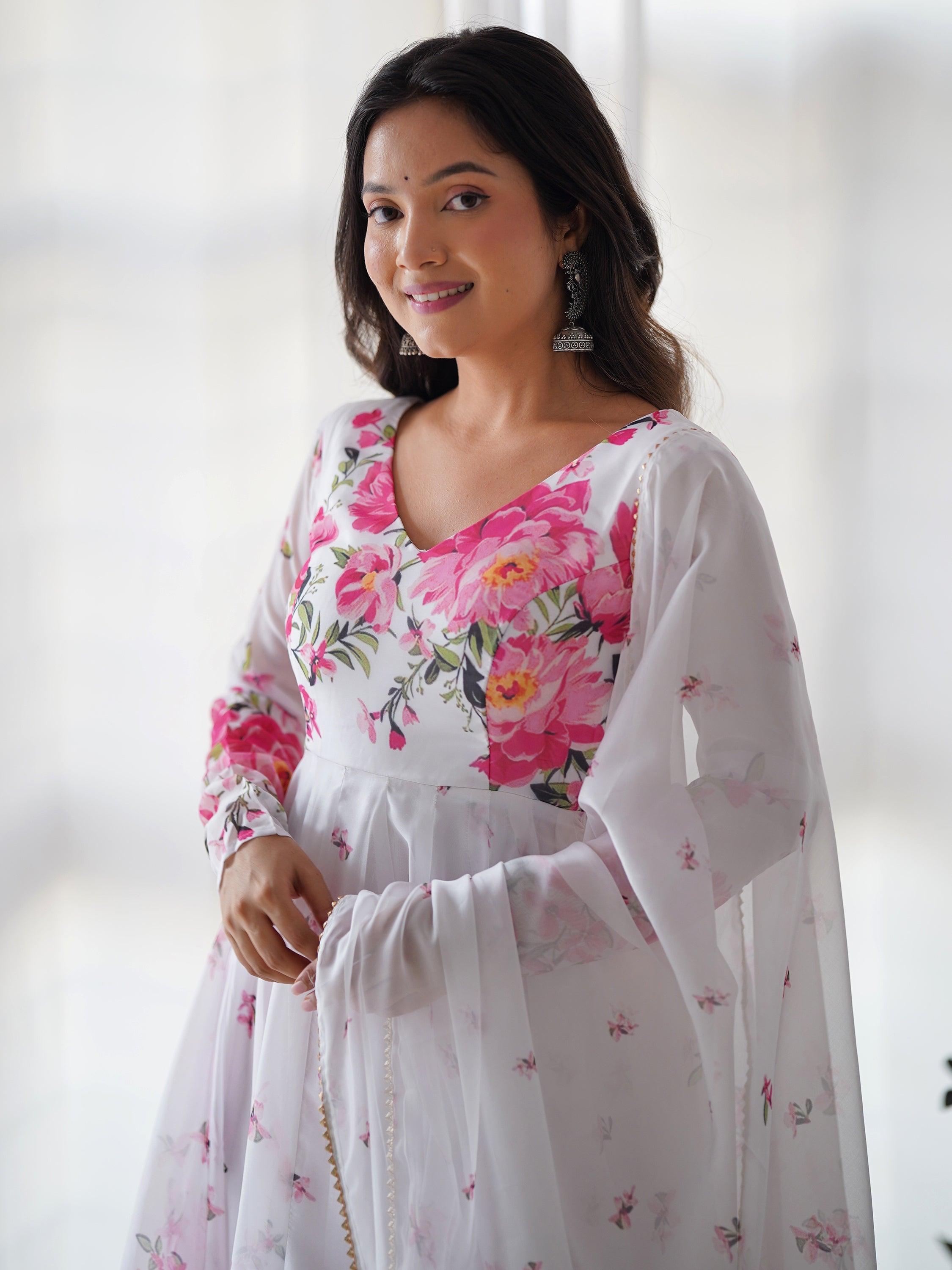 Detailed view of floral print work on white organza anarkali suit, ensuring traditional beauty with modern sophistication